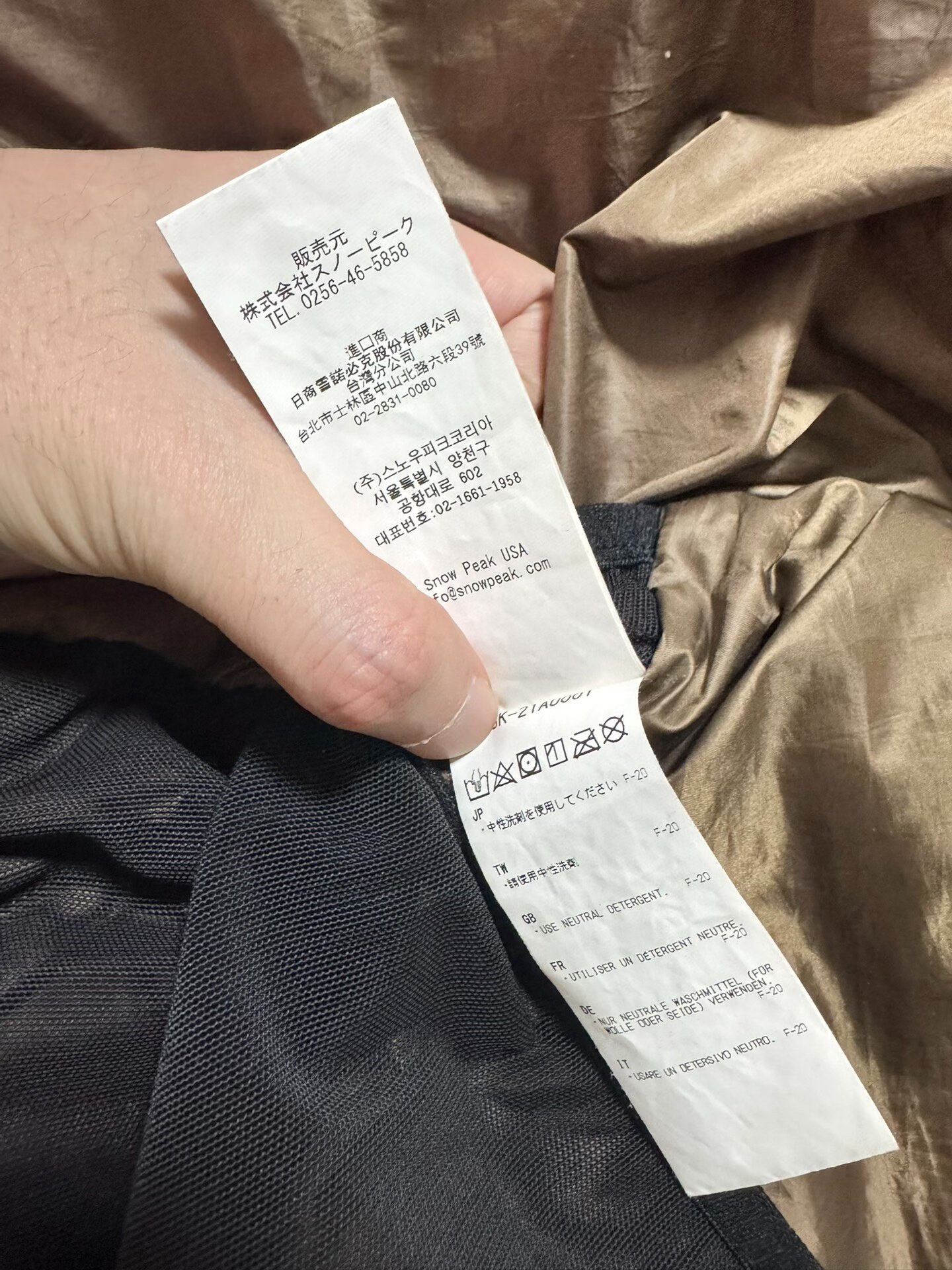 Snow Peak 21AW Flame-Retardant Down Jacket — label