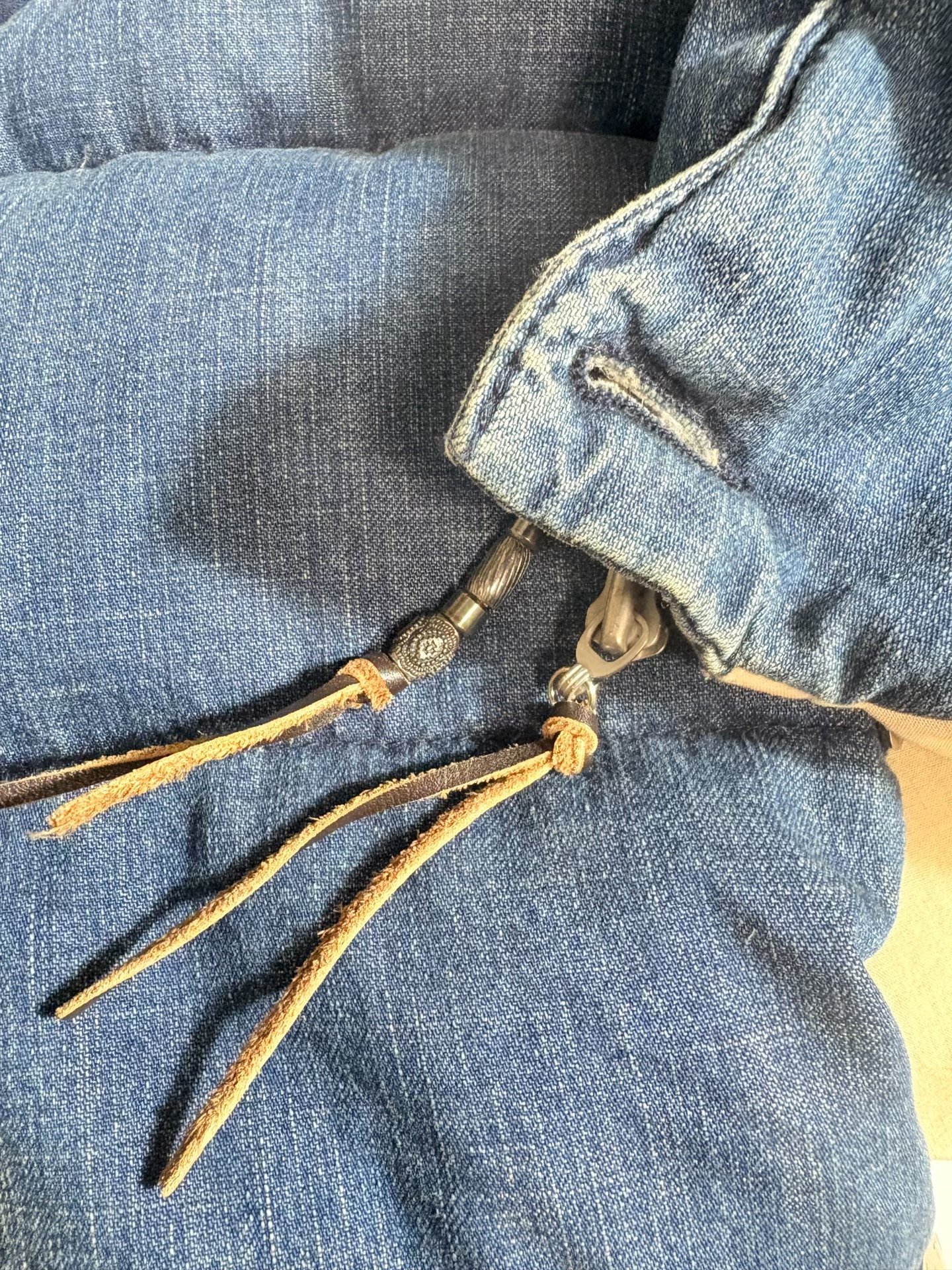 REMI RELIEF Indigo Dyed Down Vest — label