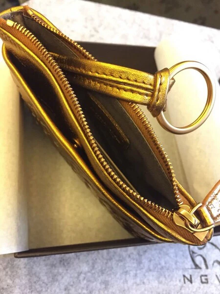 Bottega Veneta Gold Coin Purse — front