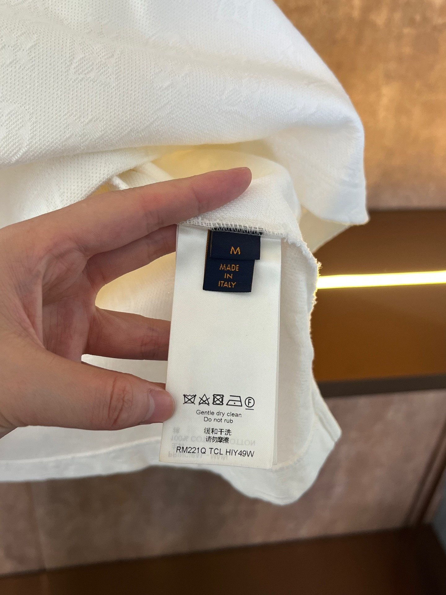Louis Vuitton White Embossed Print Pocket Tee — detail