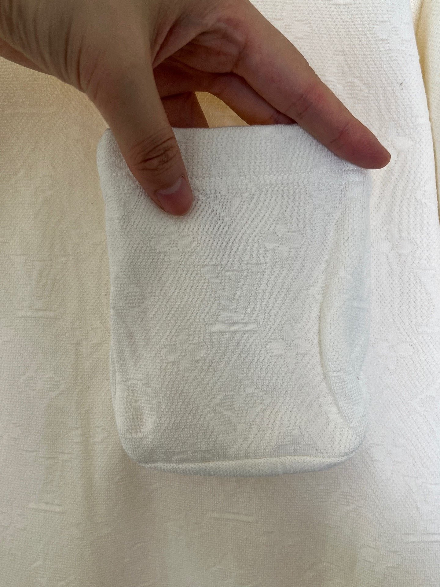 Louis Vuitton White Embossed Print Pocket Tee — back