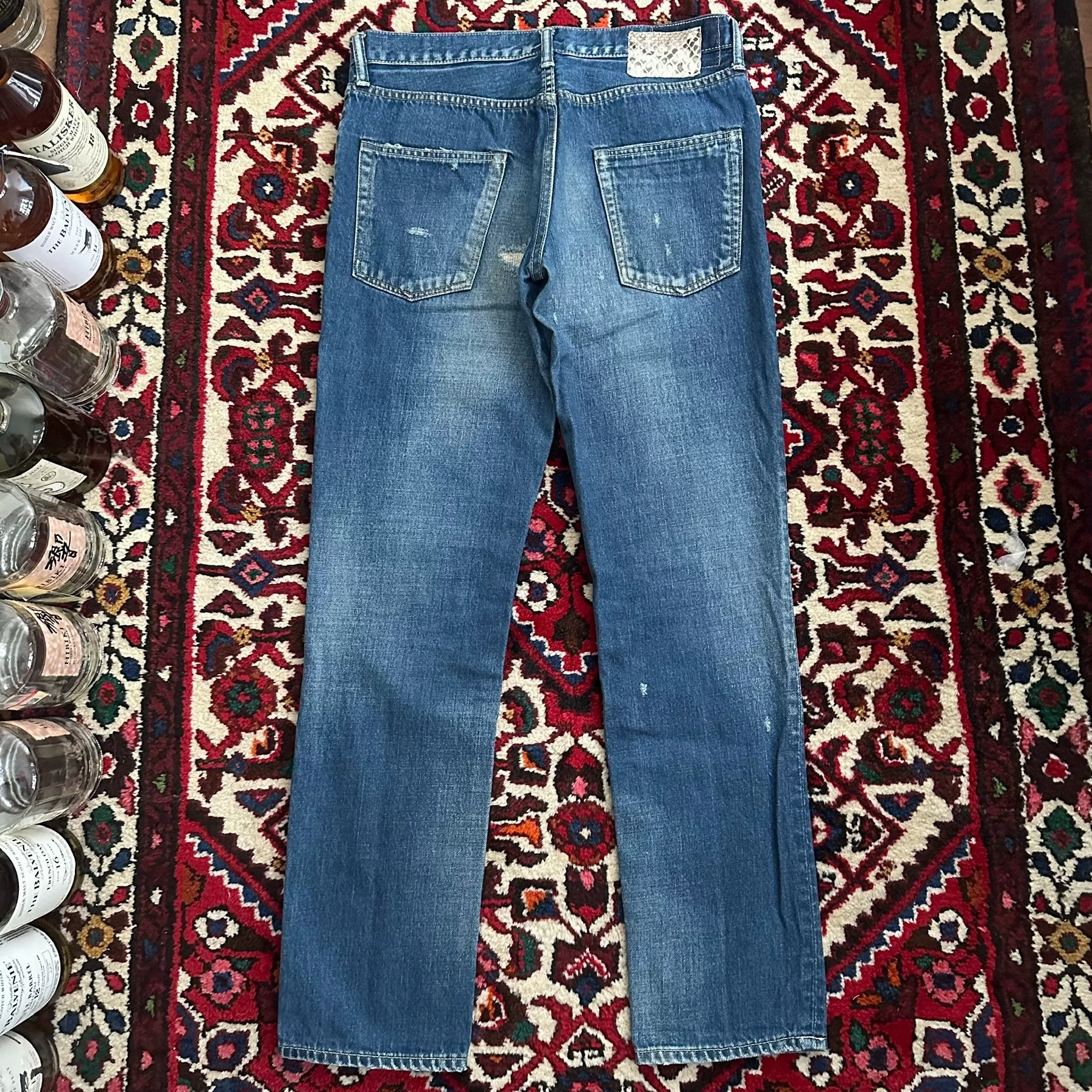 visvim 10AW Yellow Mud Wash Jeans — front
