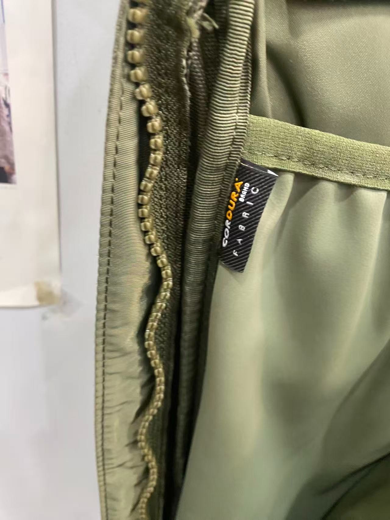 VISVIM Cordura Army Green Backpack — label