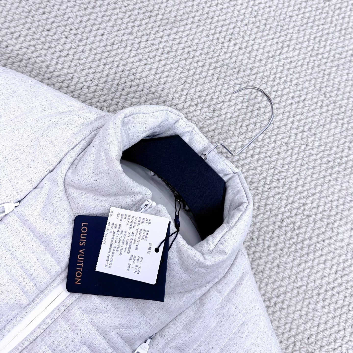 Louis Vuitton Embossed LV Down Vest — detail