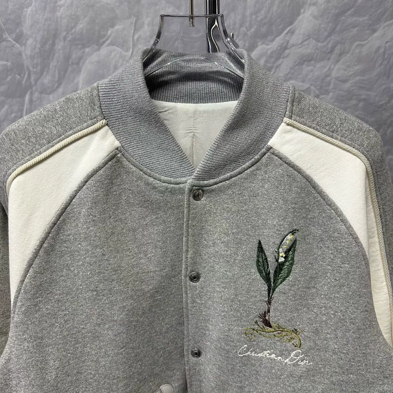 DIOR SS24 Lily of the Valley Baseball Jacket — front