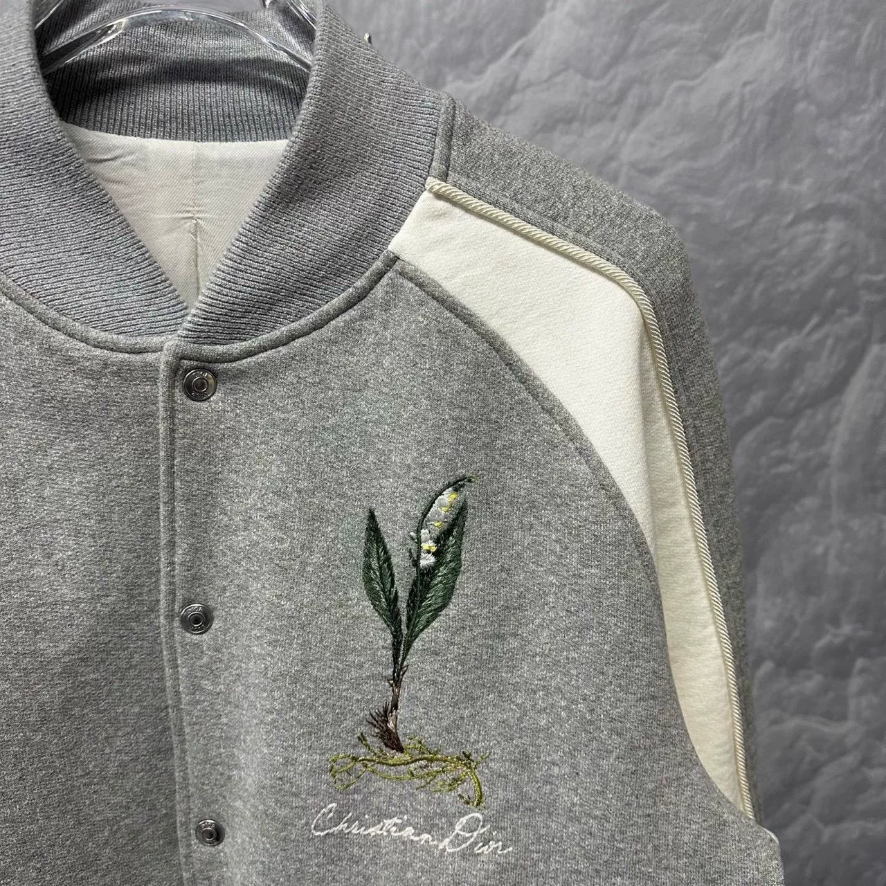 DIOR SS24 Lily of the Valley Baseball Jacket — detail