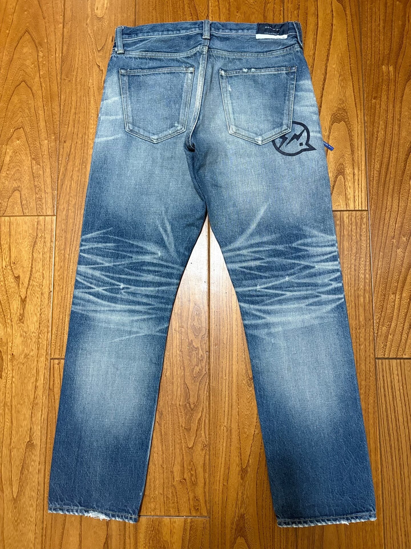 Denim by Vanquish & Fragment Washed Distressed Jeans — front