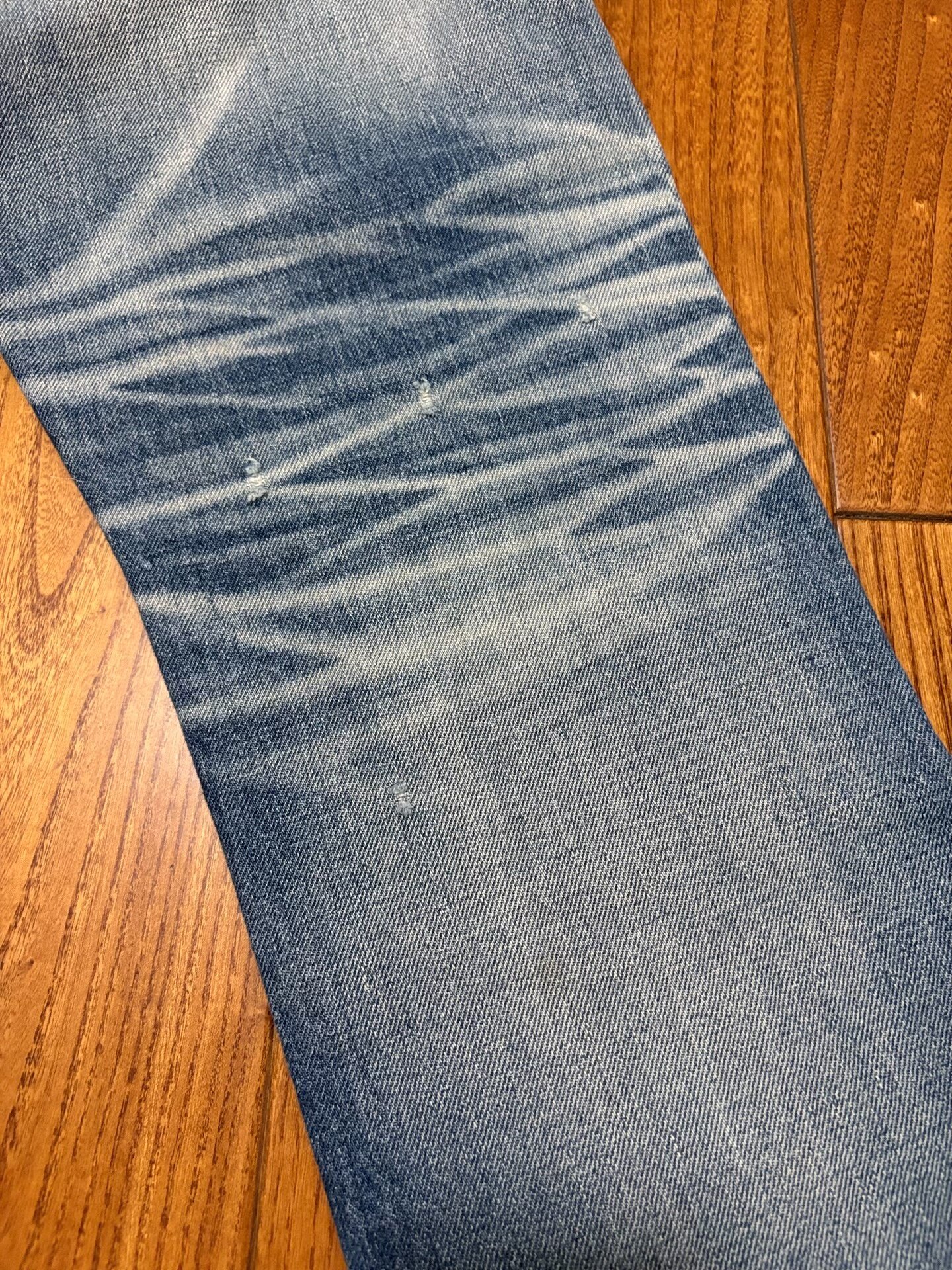 Denim by Vanquish & Fragment Washed Distressed Jeans — label