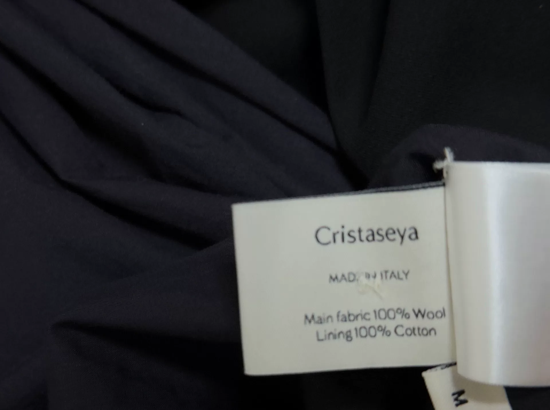 Cristaseya Long Black Shawl Collar Coat — label