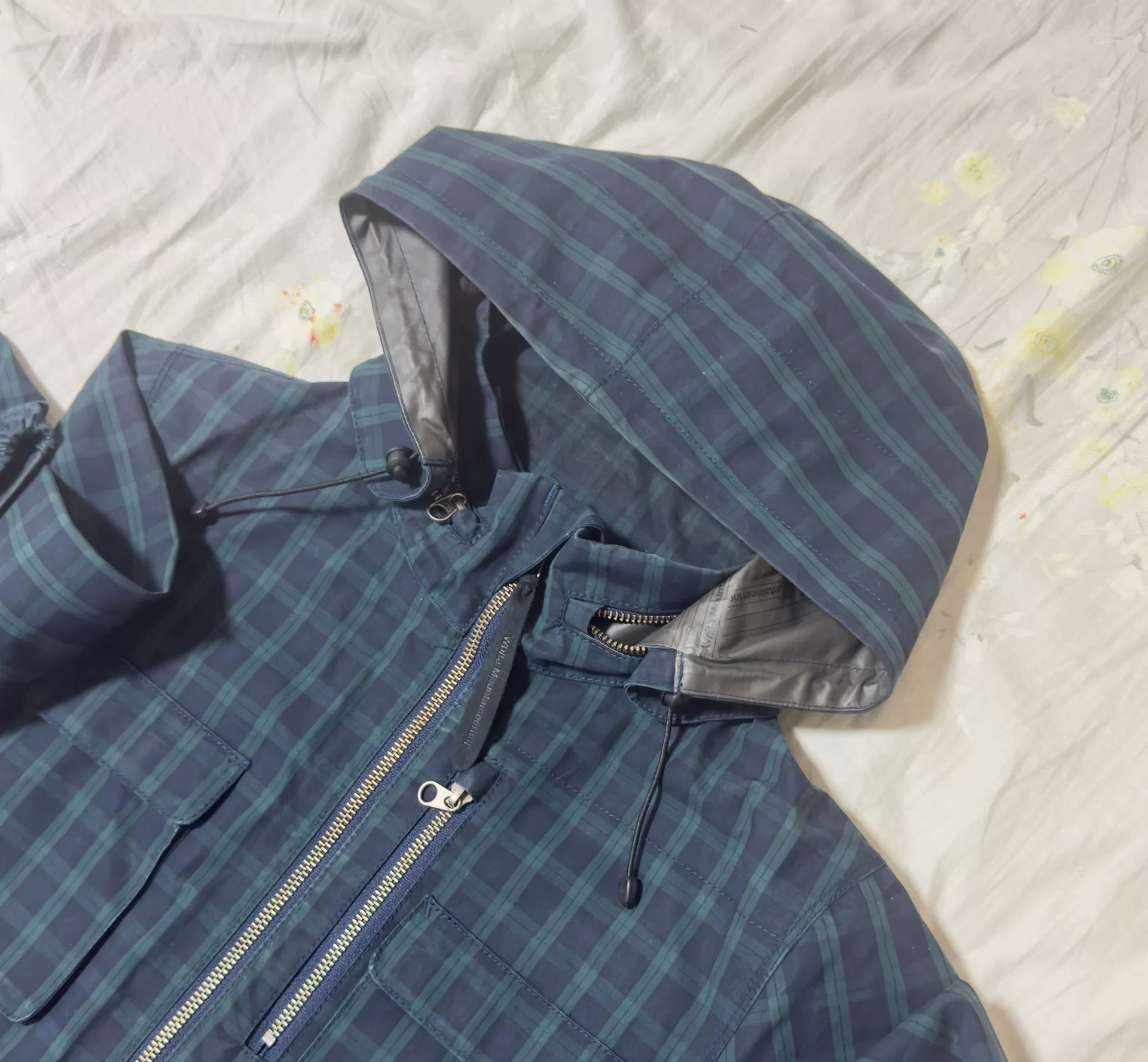 White Mountaineering Blue-Green Plaid Jacket — label