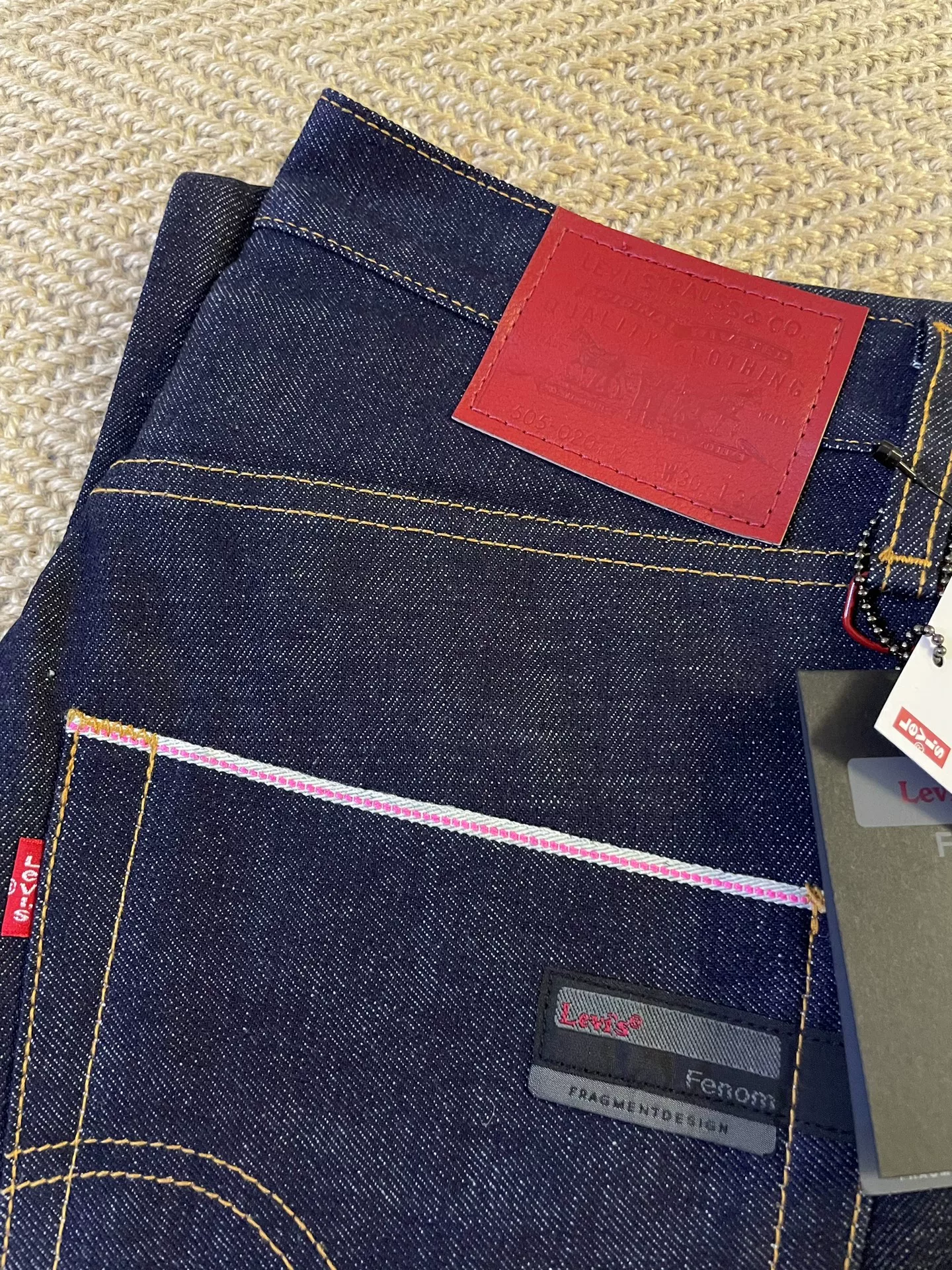 FENOM X AFFA Red Ghost Raw Unwashed Jeans — label