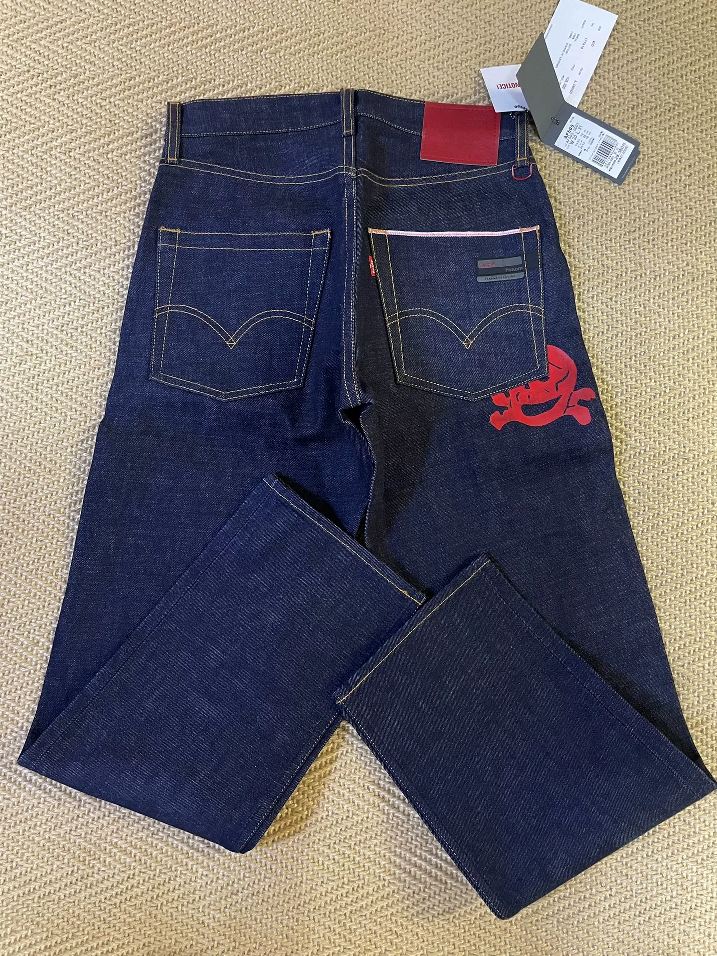 FENOM X AFFA Red Ghost Raw Unwashed Jeans — detail