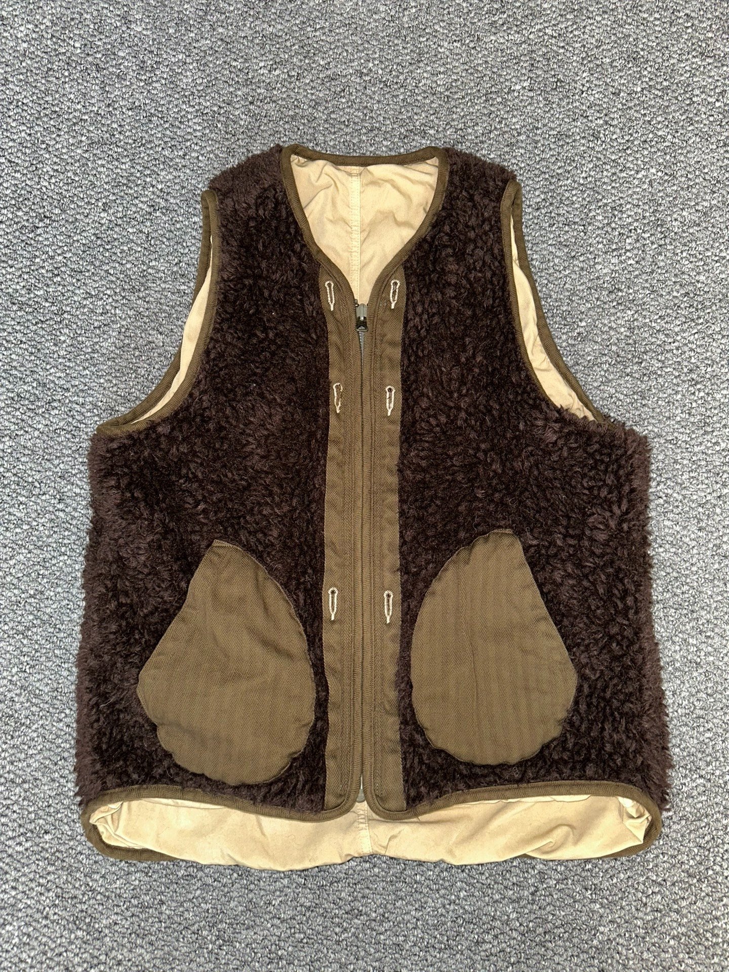visvim military-style double-sided vest — label