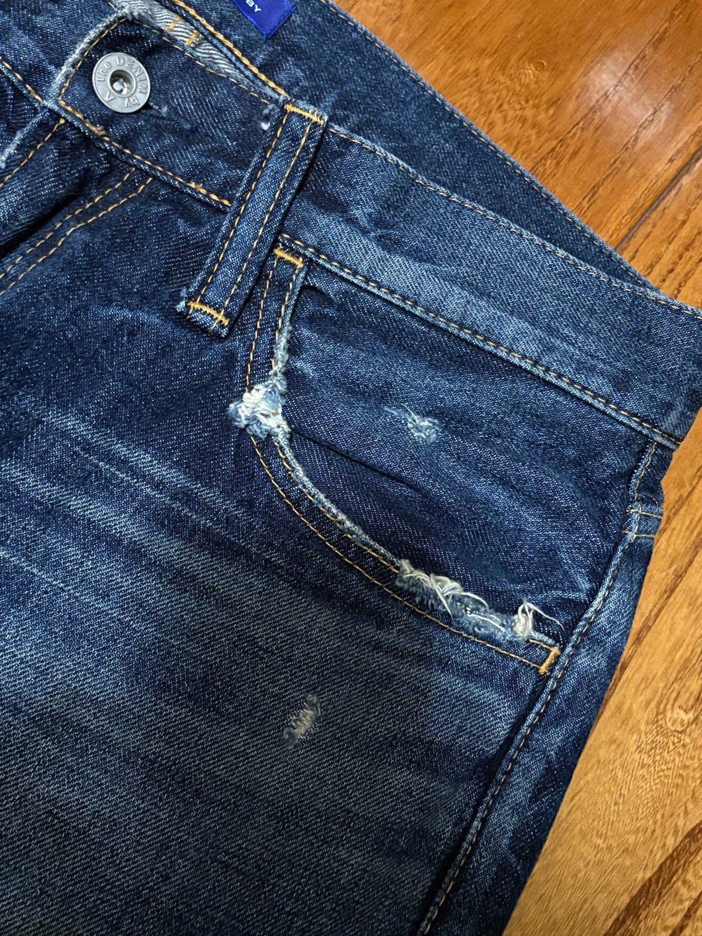 Vanquish & Fragment Heavy Washed Jeans — label