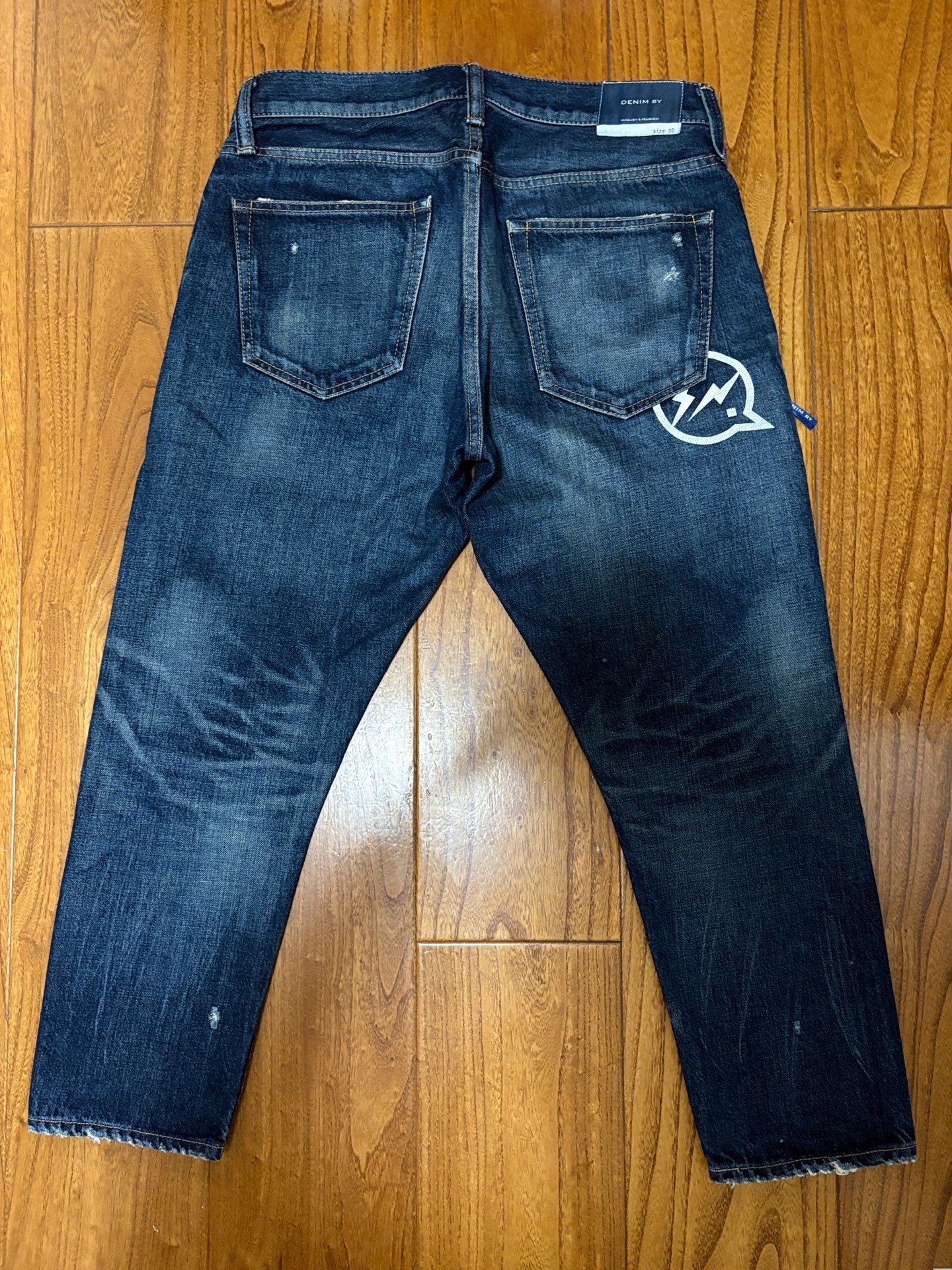 Vanquish & Fragment Heavy Washed Jeans — front