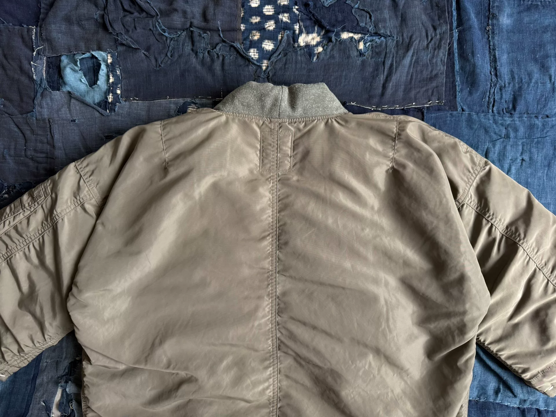 VISVIM SANJURO Kimono Down Jacket — label