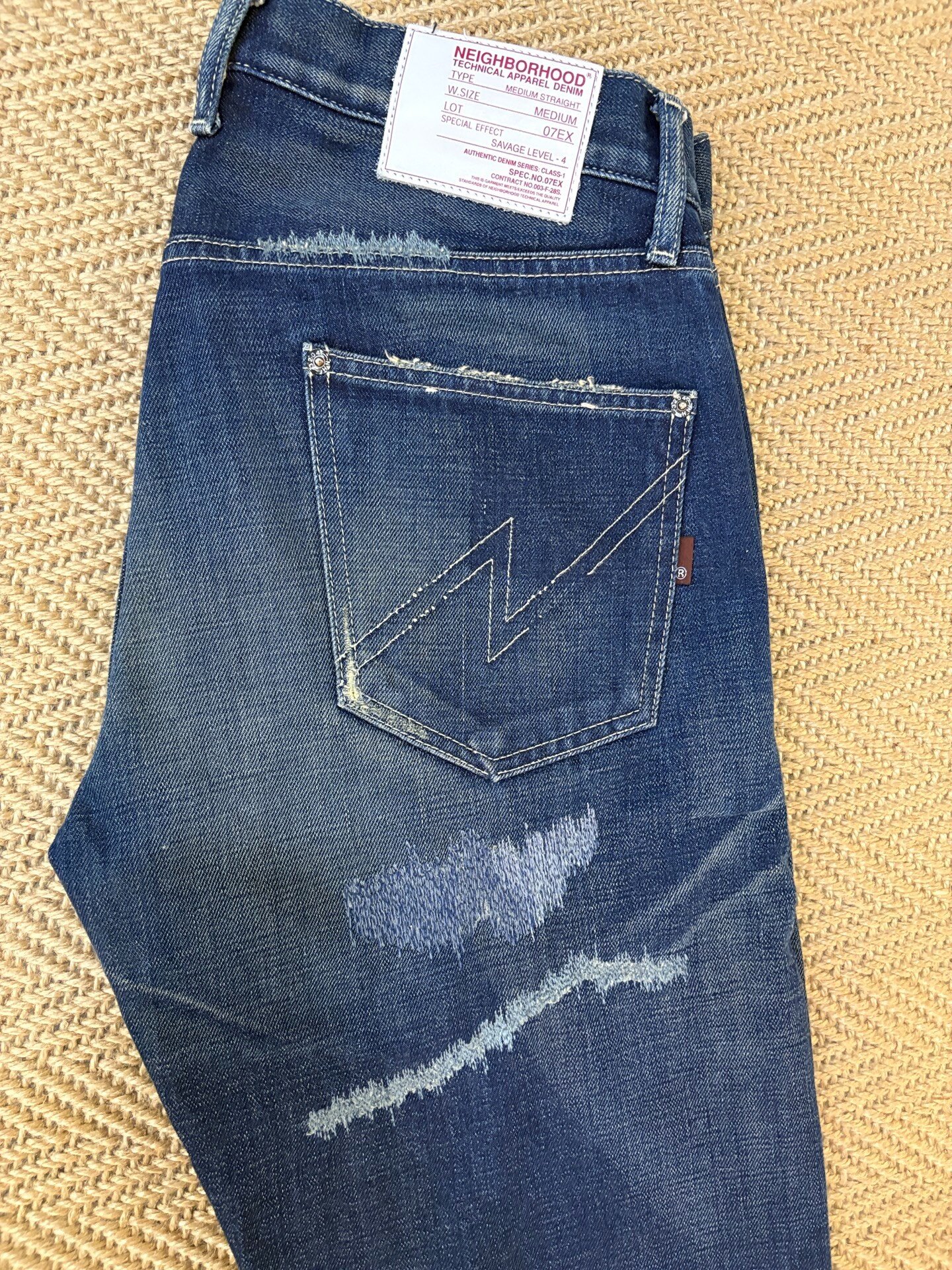 Neighborhood 07 SCAB Distressed Jeans — label
