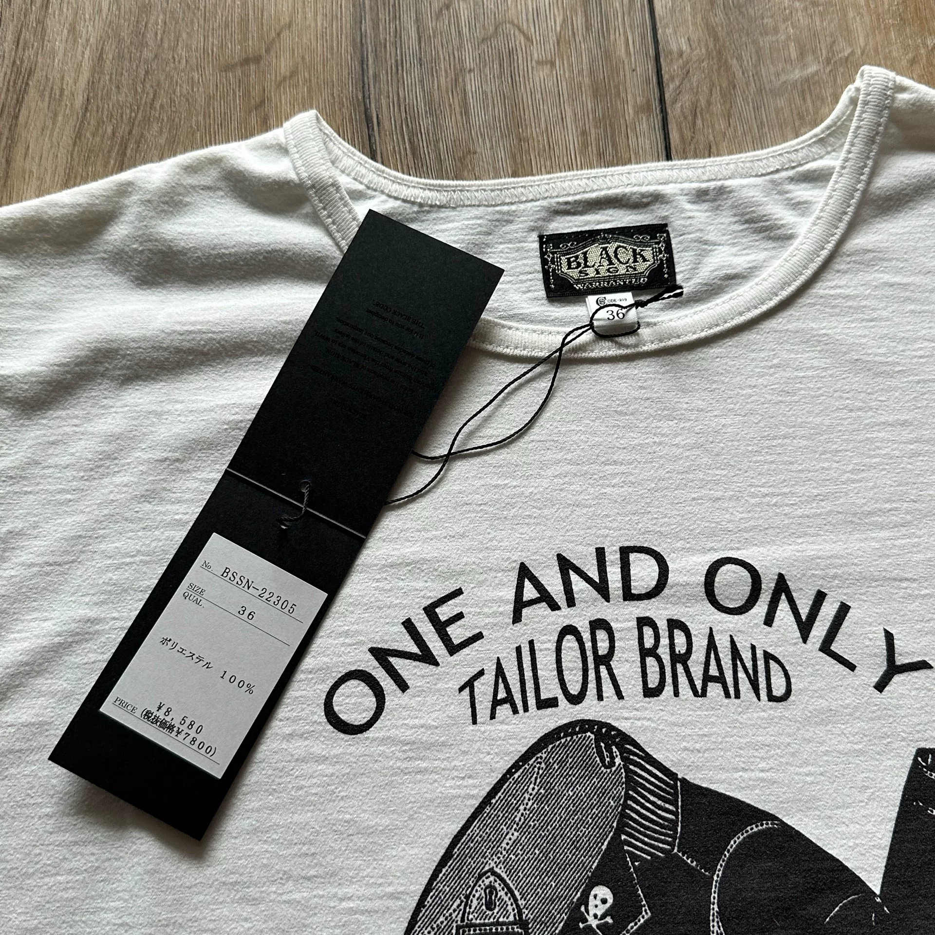 Black Sign White Vintage Graphic Tee — back