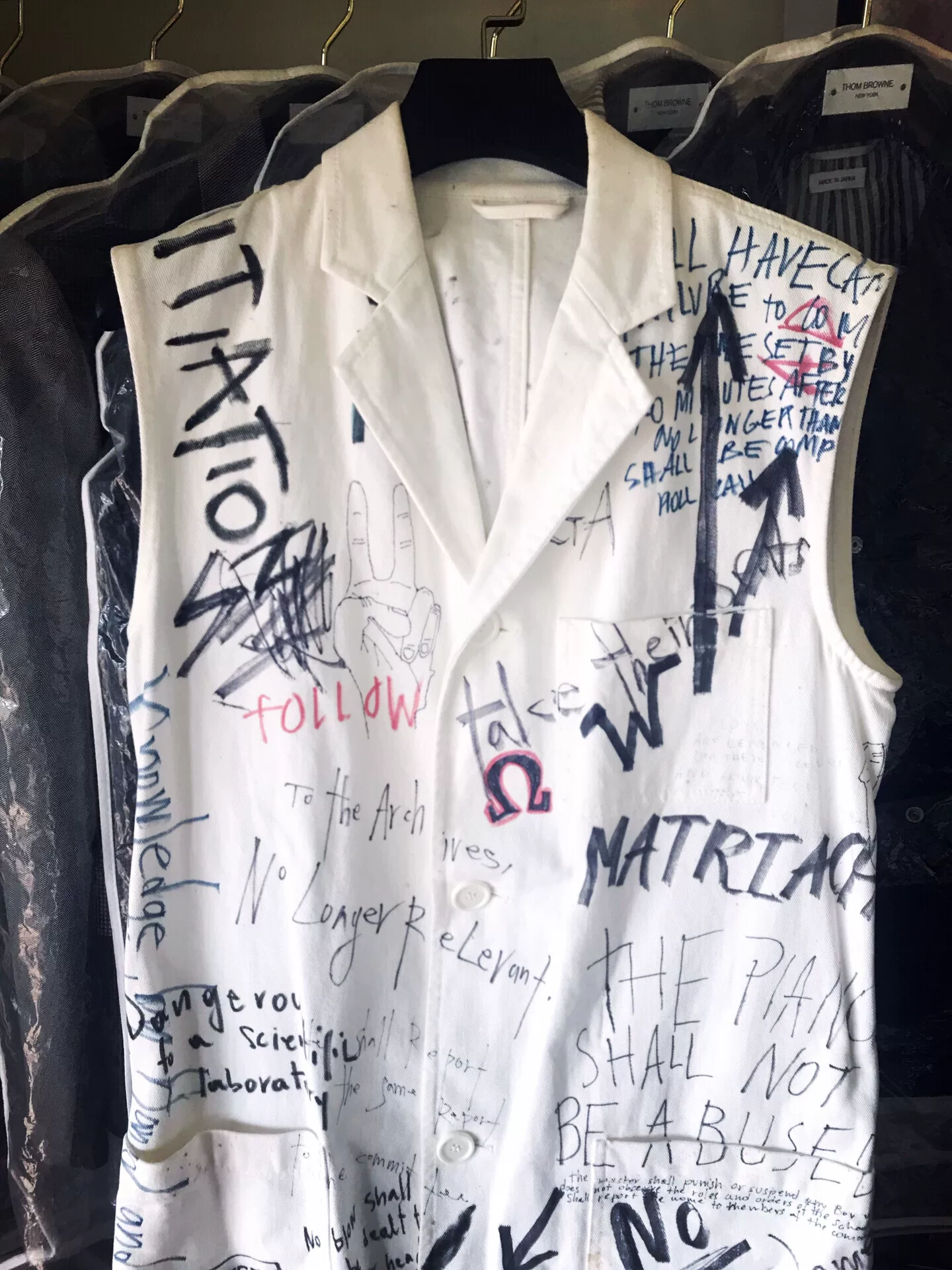 Raf Simons Archive Sleeveless Graffiti Coat — detail