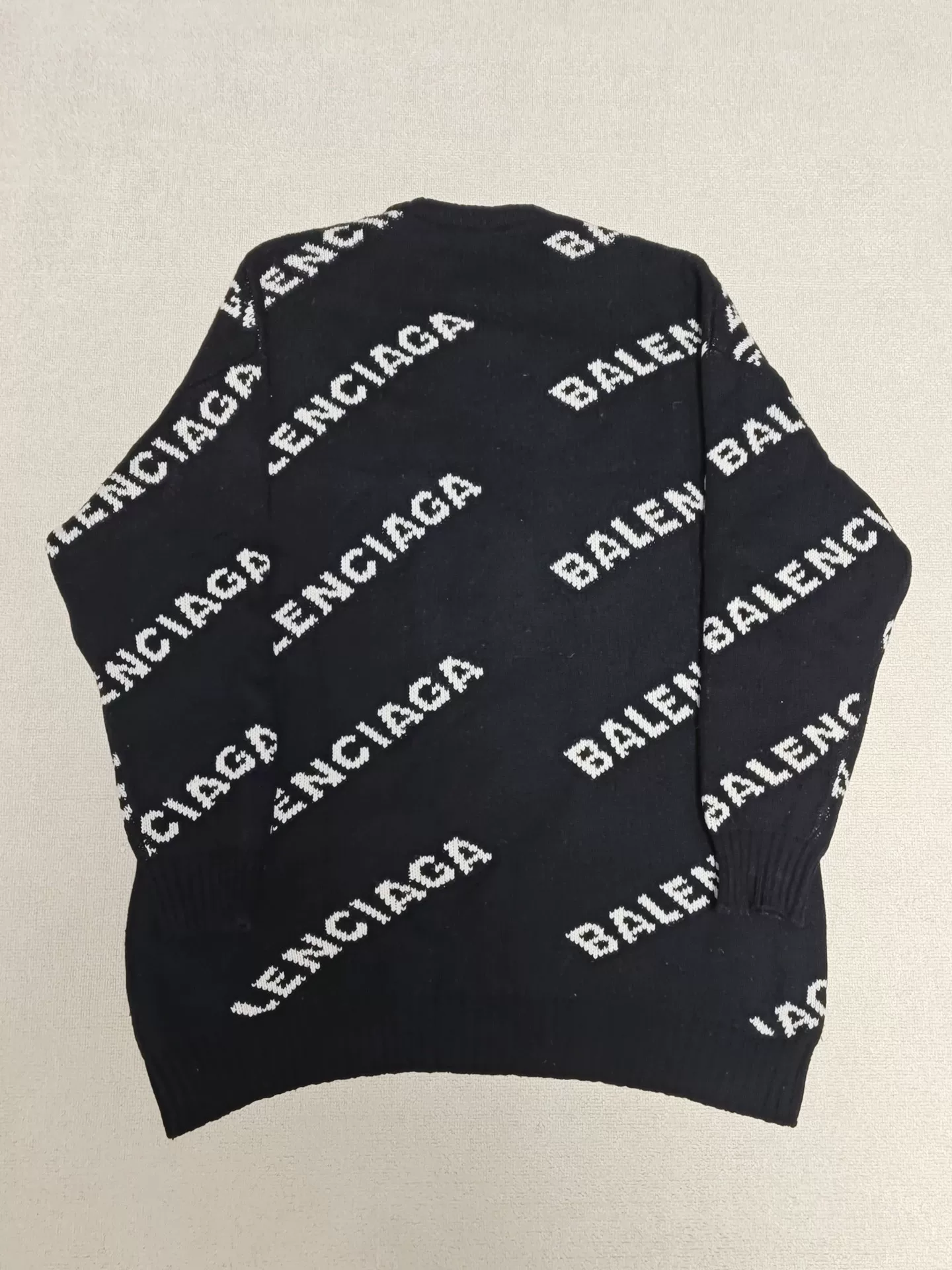 Balenciaga All-Over Logo Knit Sweater — front