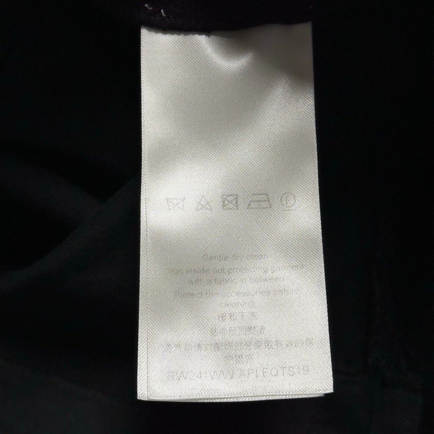 Louis Vuitton SS24 Zip Off-Shoulder Top — label