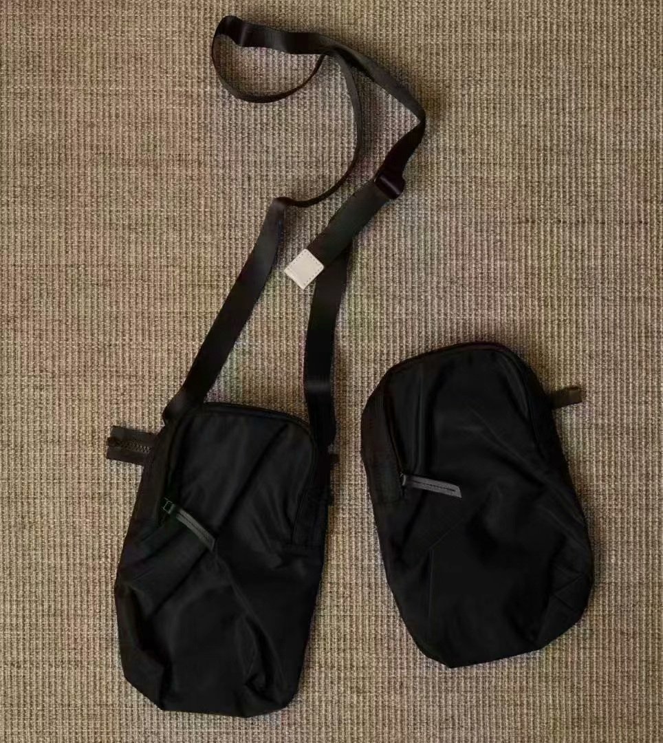 Hender Scheme Double Pocket Backpack — label