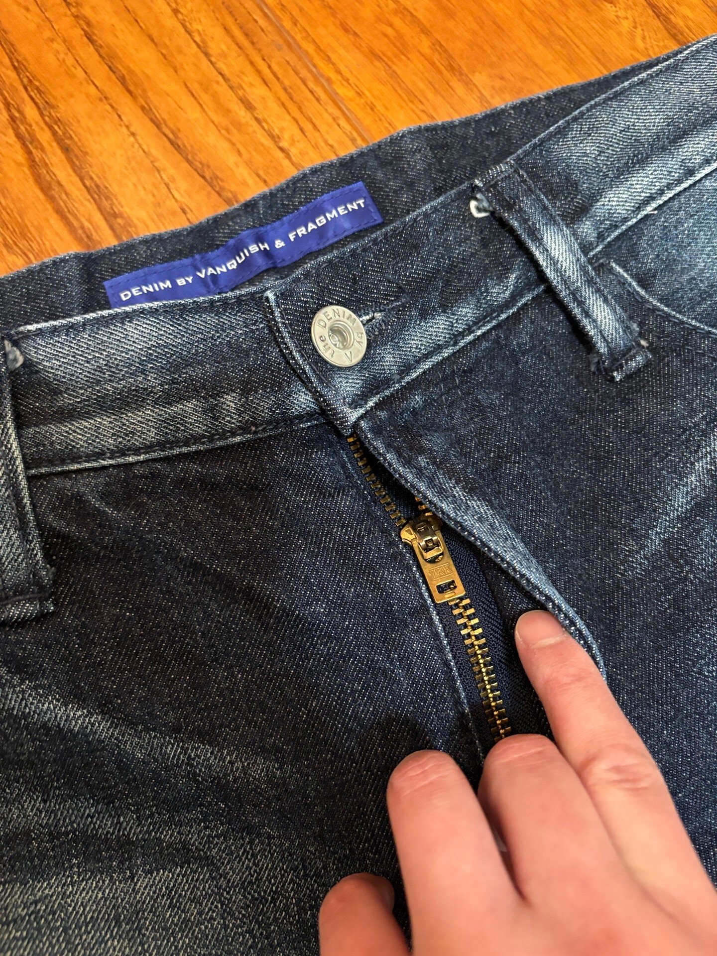 Vanquish & Fragment Cropped Denim Jeans — label