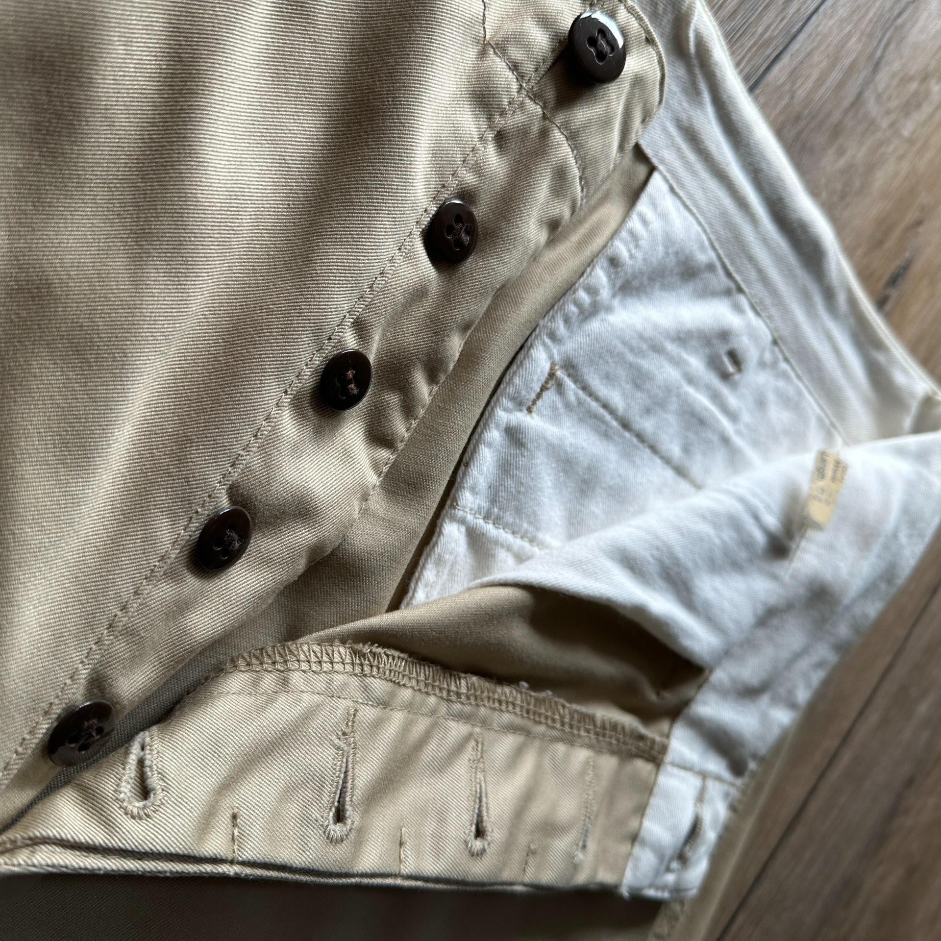 Cushman Khaki Wide-Leg Pants — label