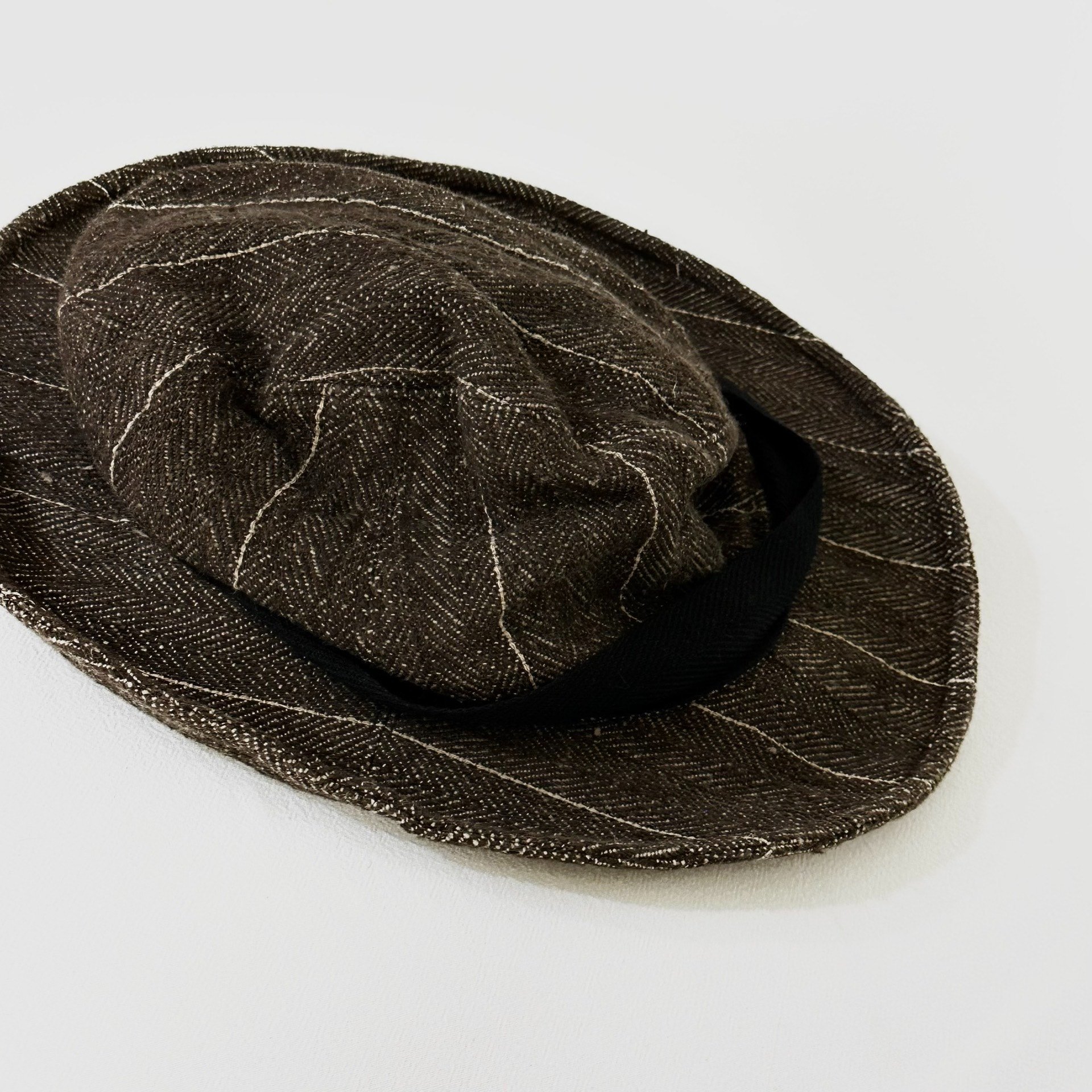 Andrew Driftwood Walnut Dyed Bucket Hat — label