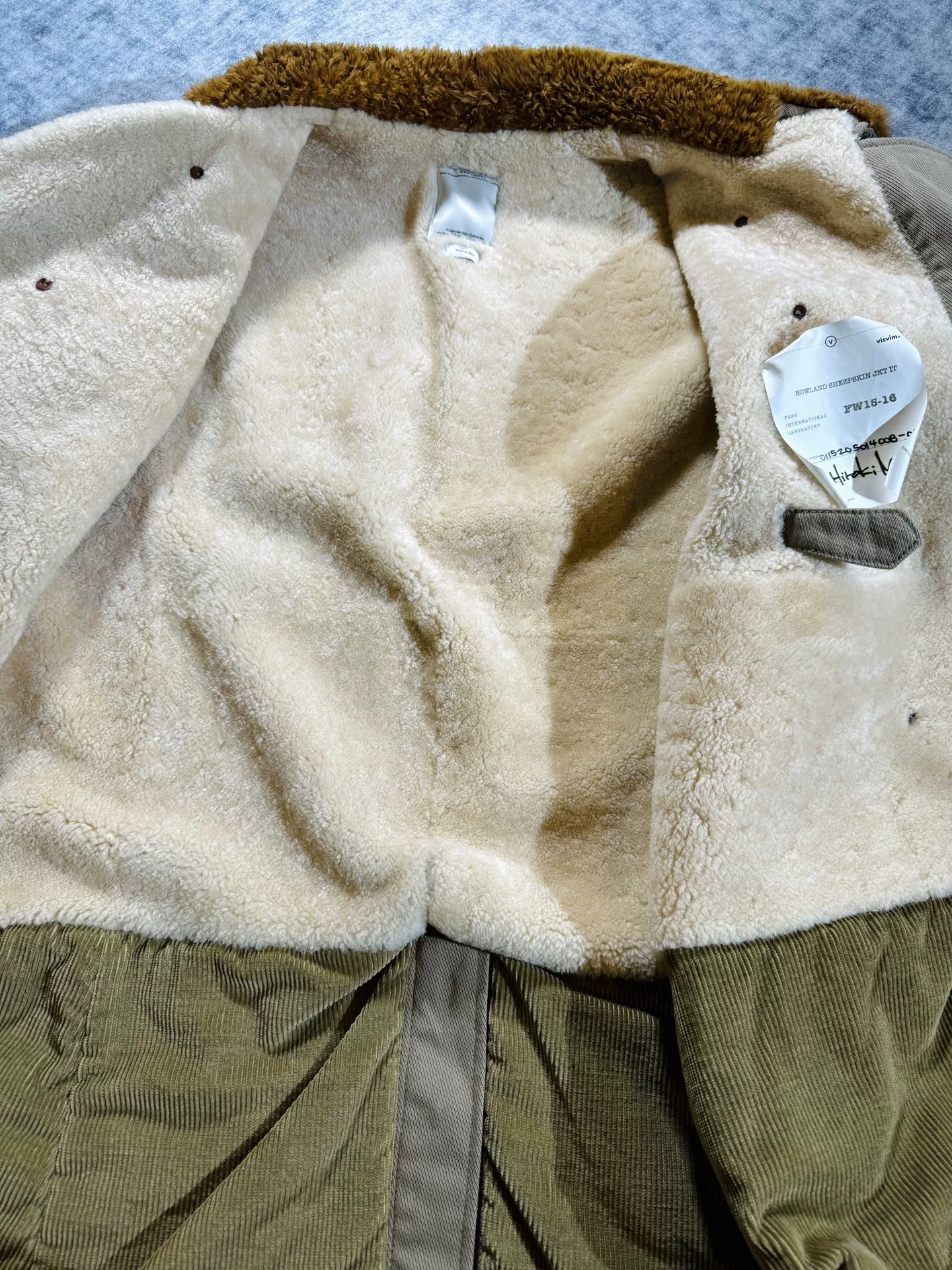visvim howland sheepskin IT coat — label