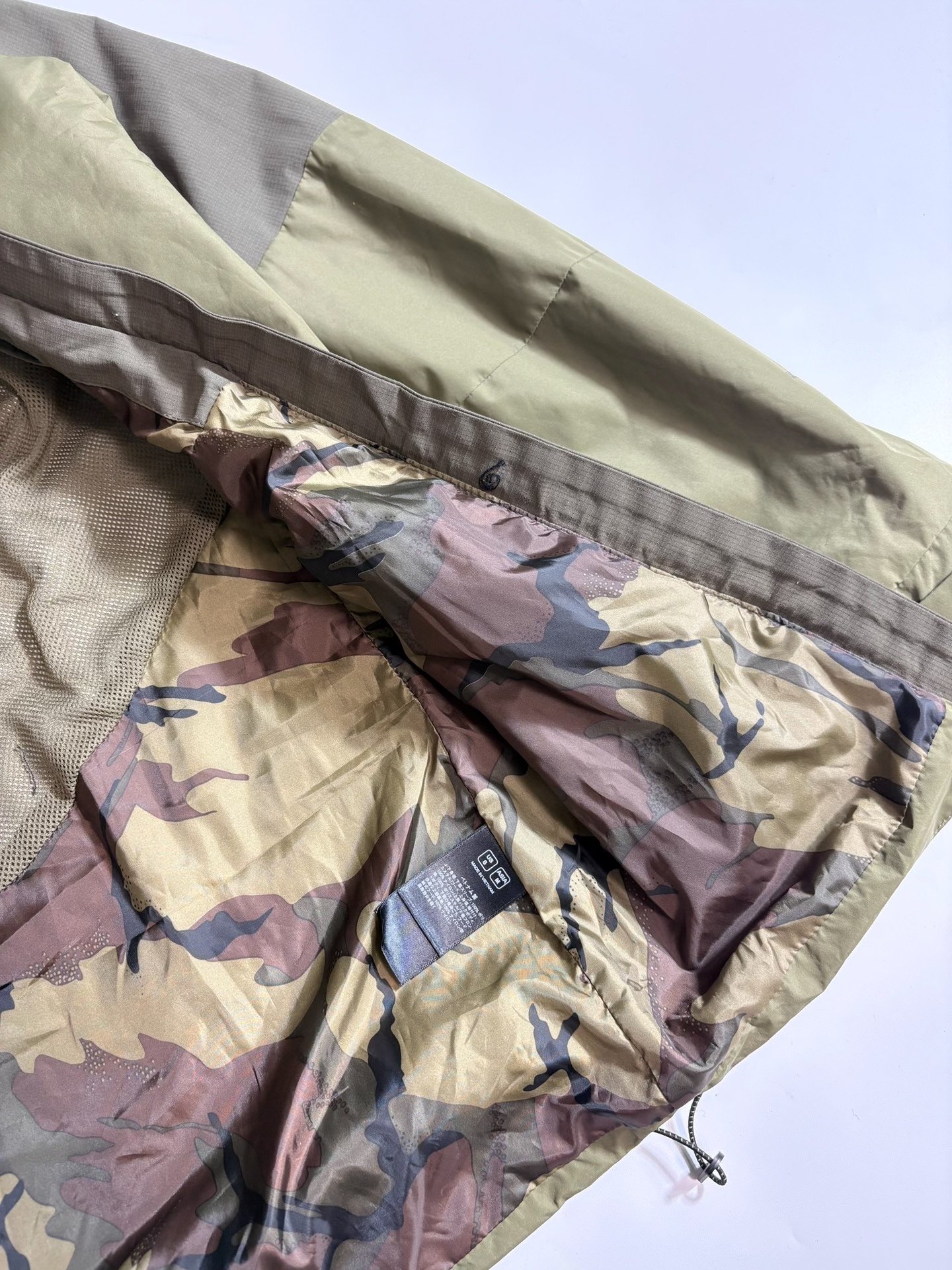 The North Face Olive Green Functional Jacket — label