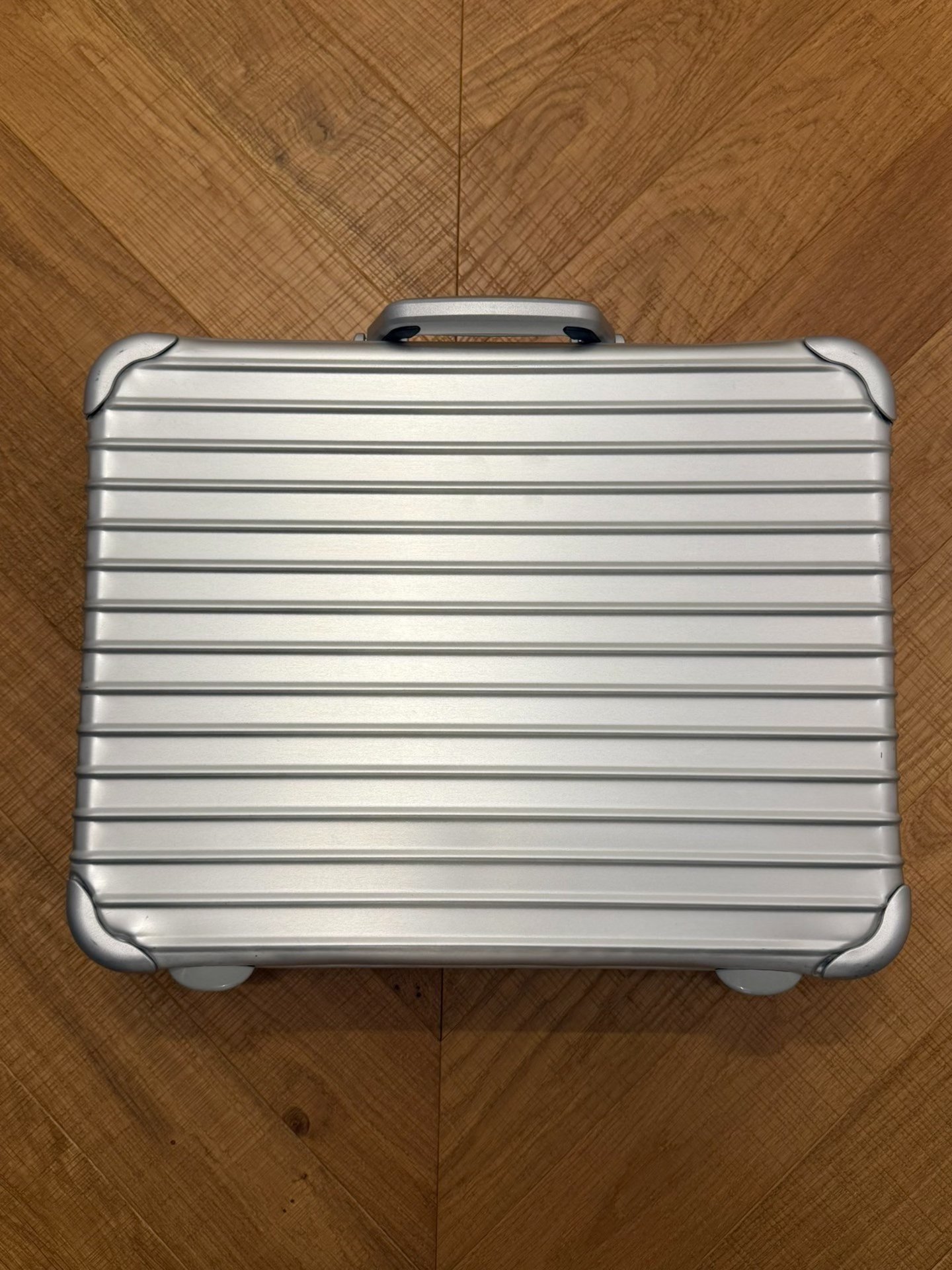 Rimowa Orange Leather Watch Hand Case