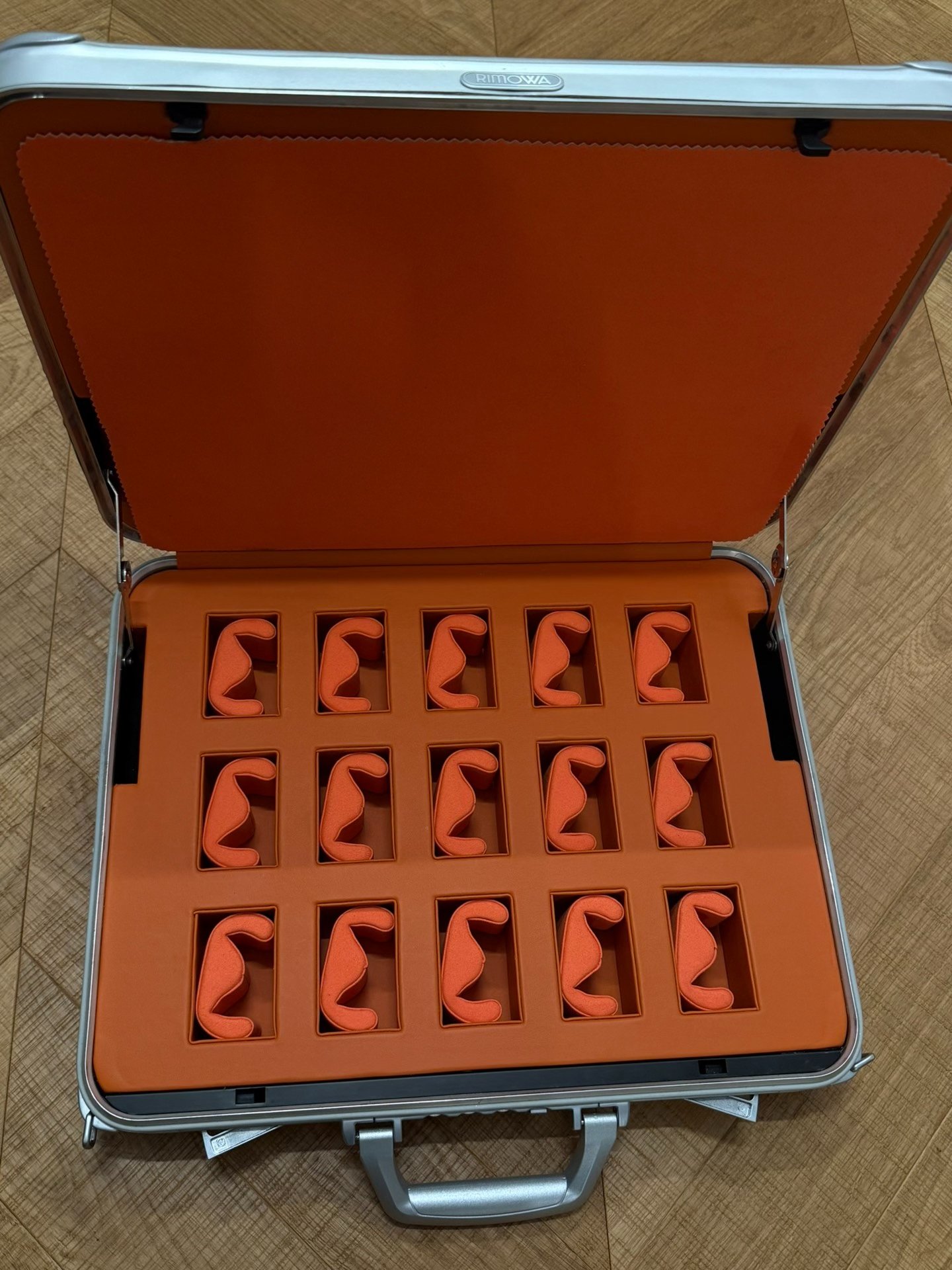 Rimowa Orange Leather Watch Hand Case — detail
