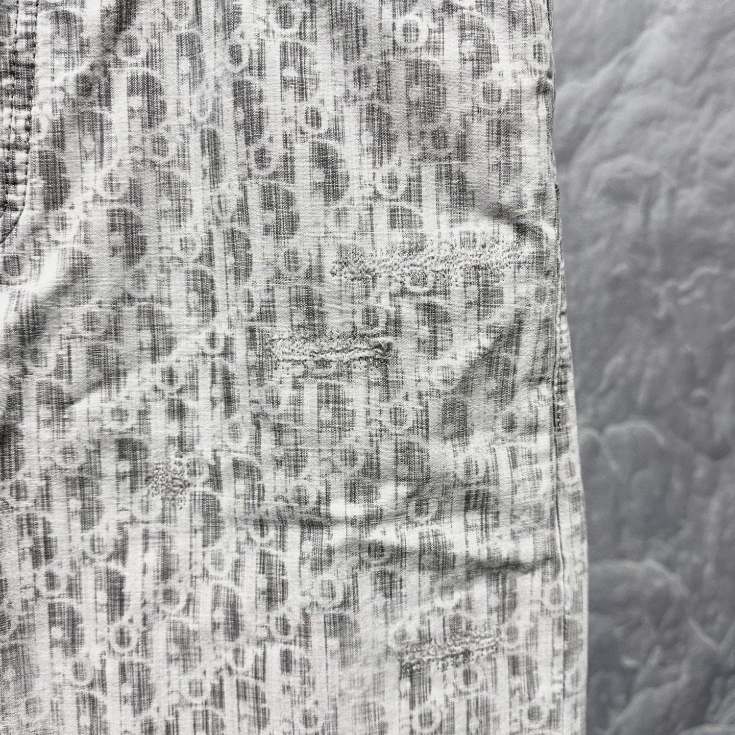 Dior Monogram Distressed Straight Jeans — front