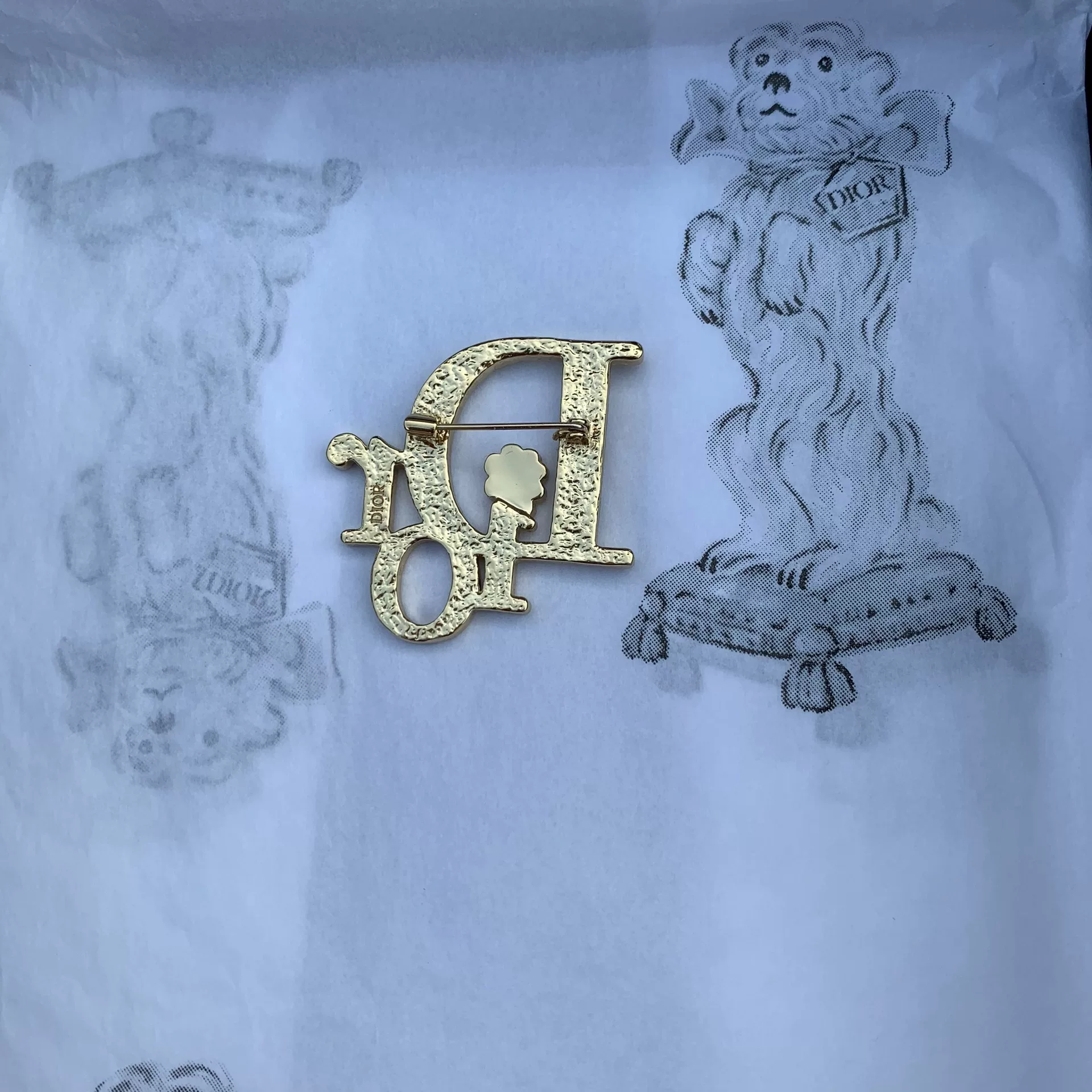 Dior Gold Letter Flower Brooch — detail