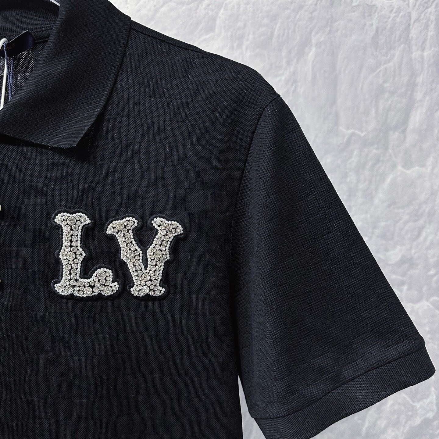 Louis Vuitton SS24 Pharrell Damier Beaded Polo — detail