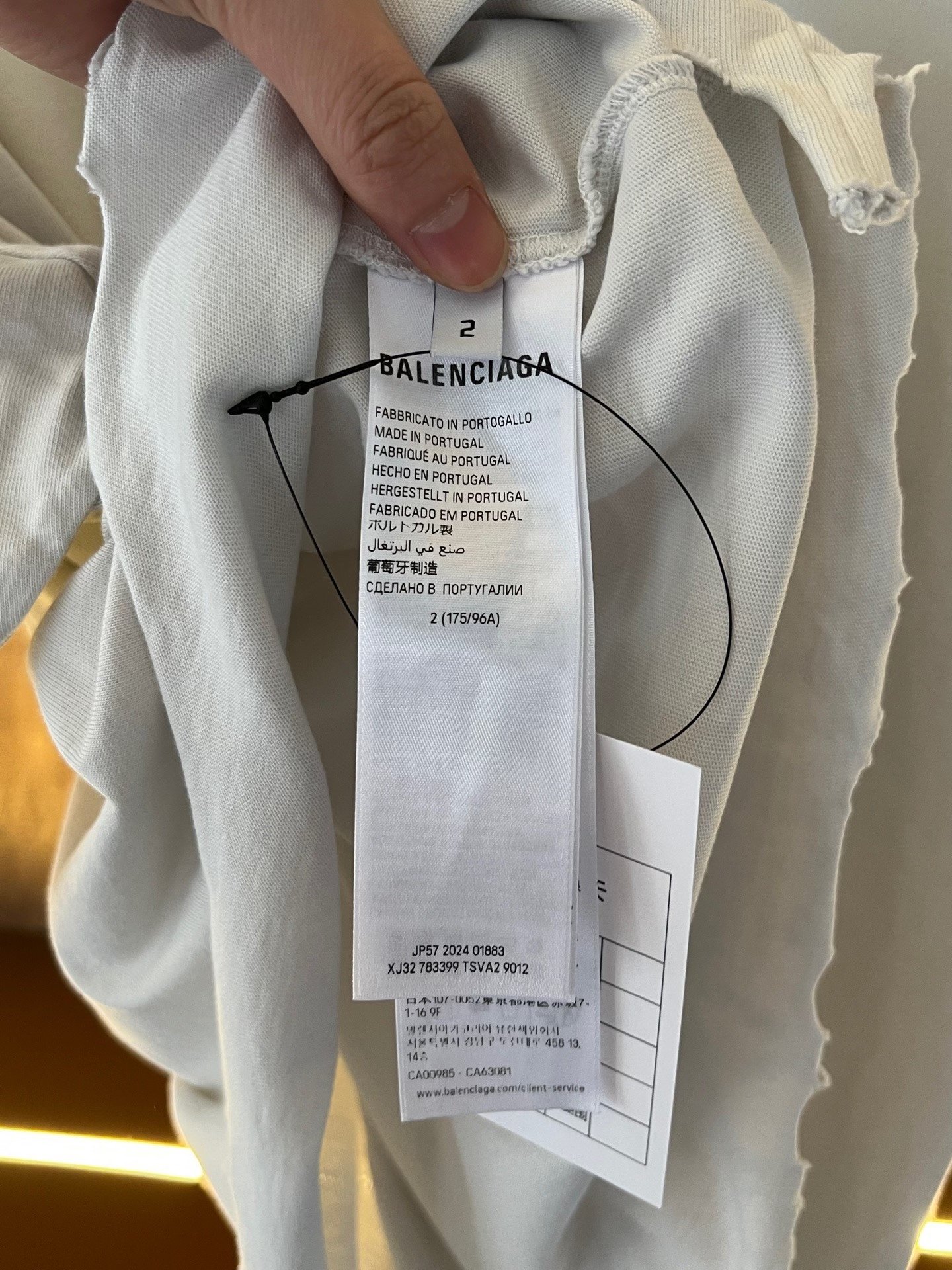 Balenciaga Distressed Hem Patch Logo Tee — detail