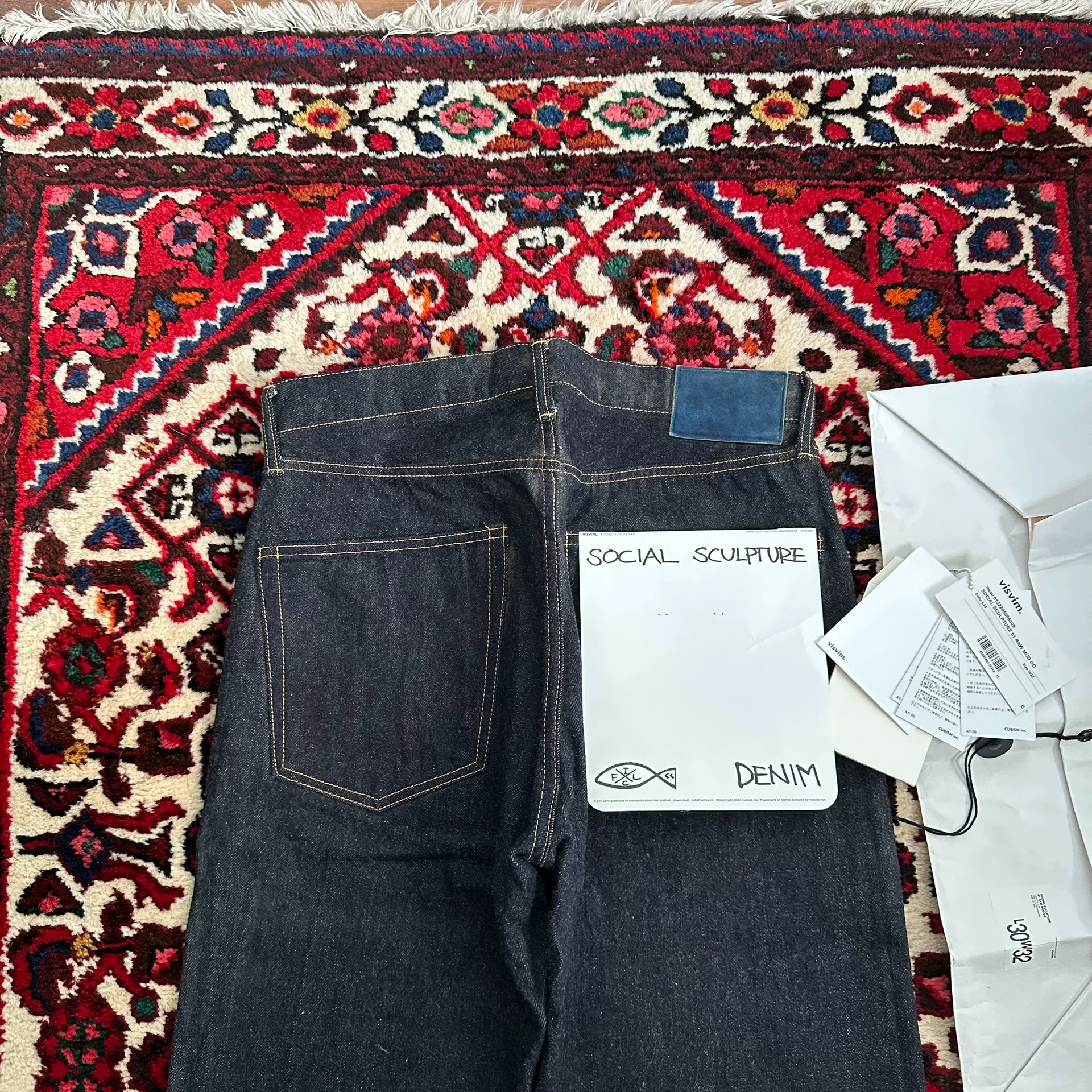visvim 22AW 01MUD Mud-Dyed Jeans — label