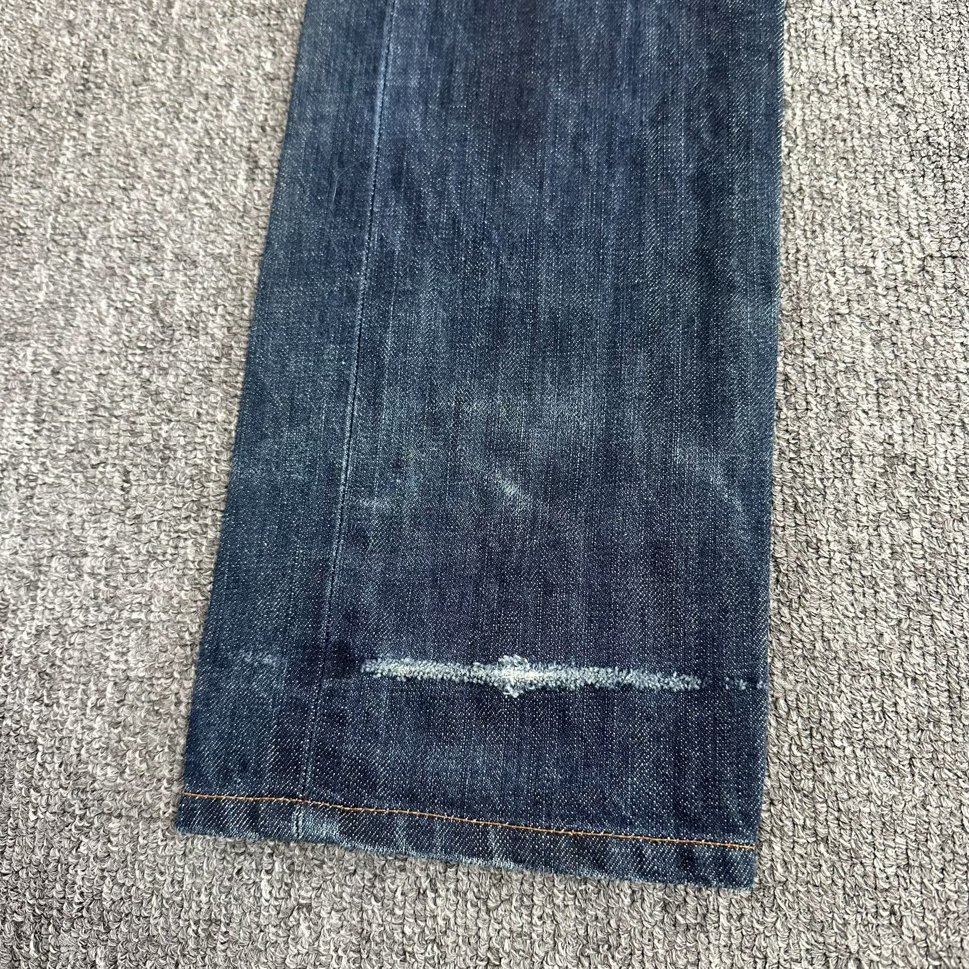 Dior Homme Indigo Destroyed Hem Jeans — front