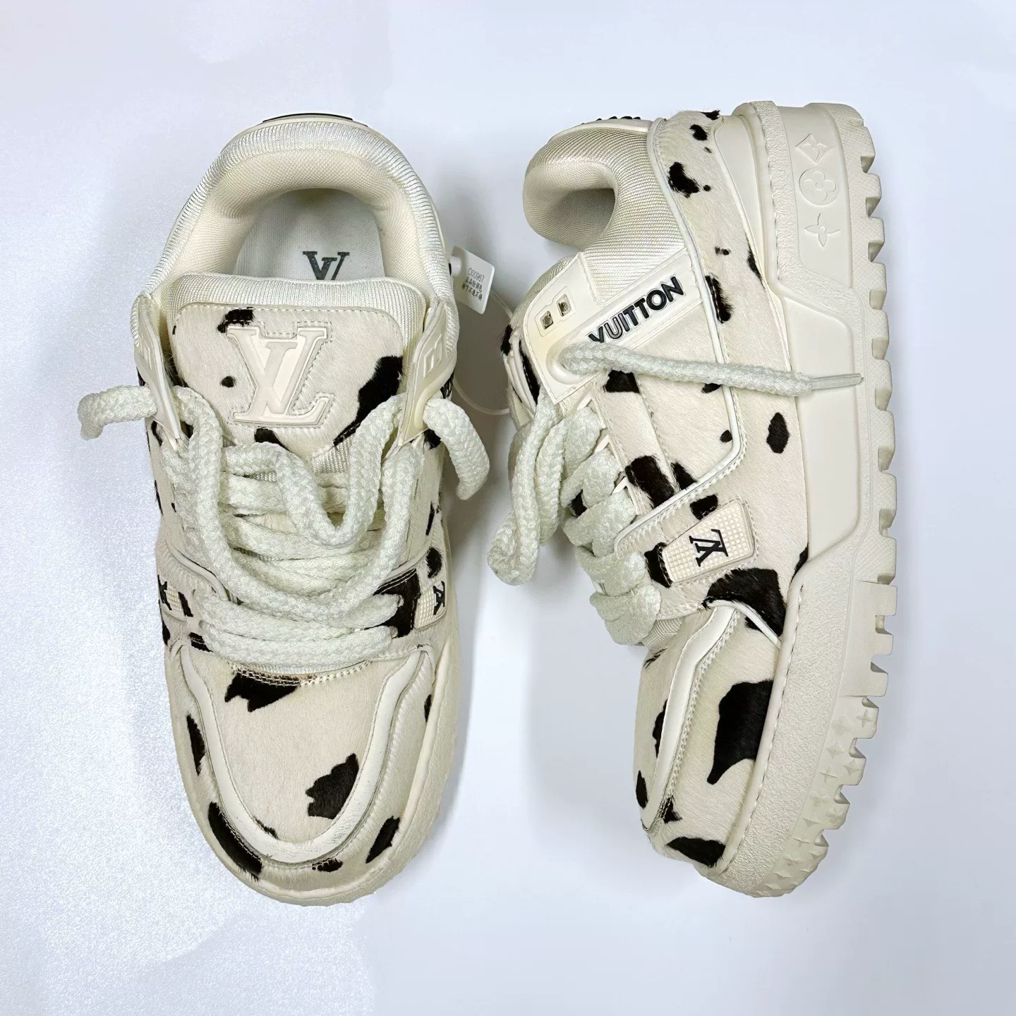 Louis Vuitton Trainer Maxi Cow Print Sneakers — front