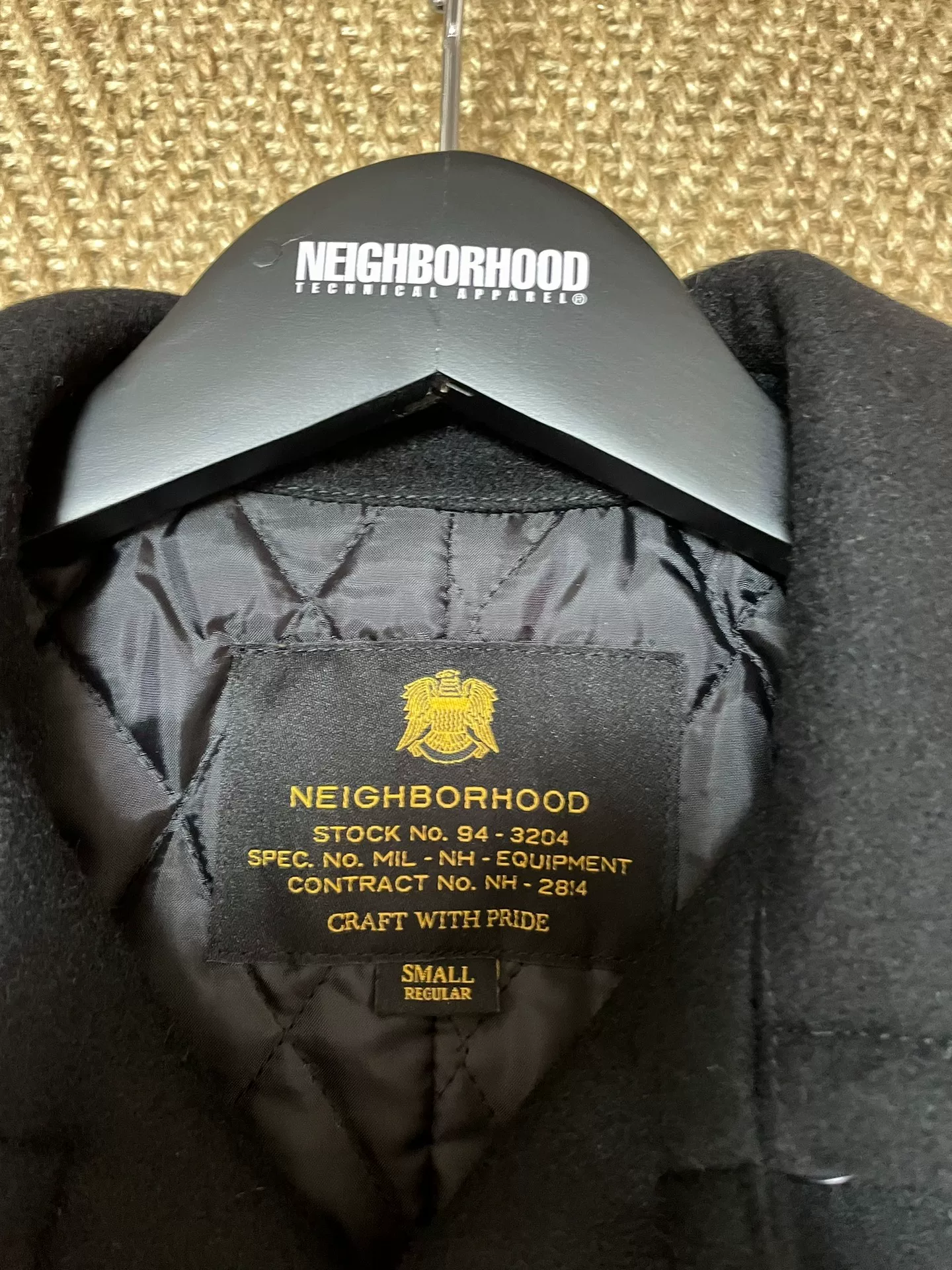Neighborhood Wool Double-Breasted Coat — label