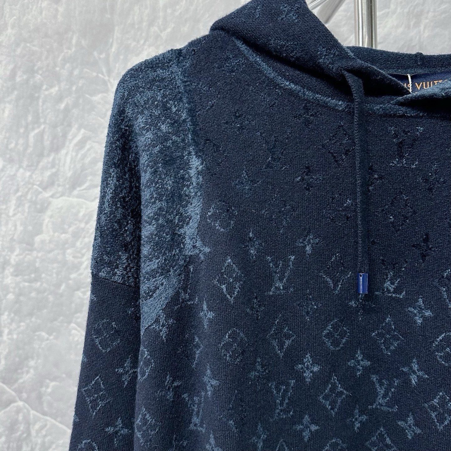 Louis Vuitton SS26 Patchwork Logo Wool Hoodie — detail