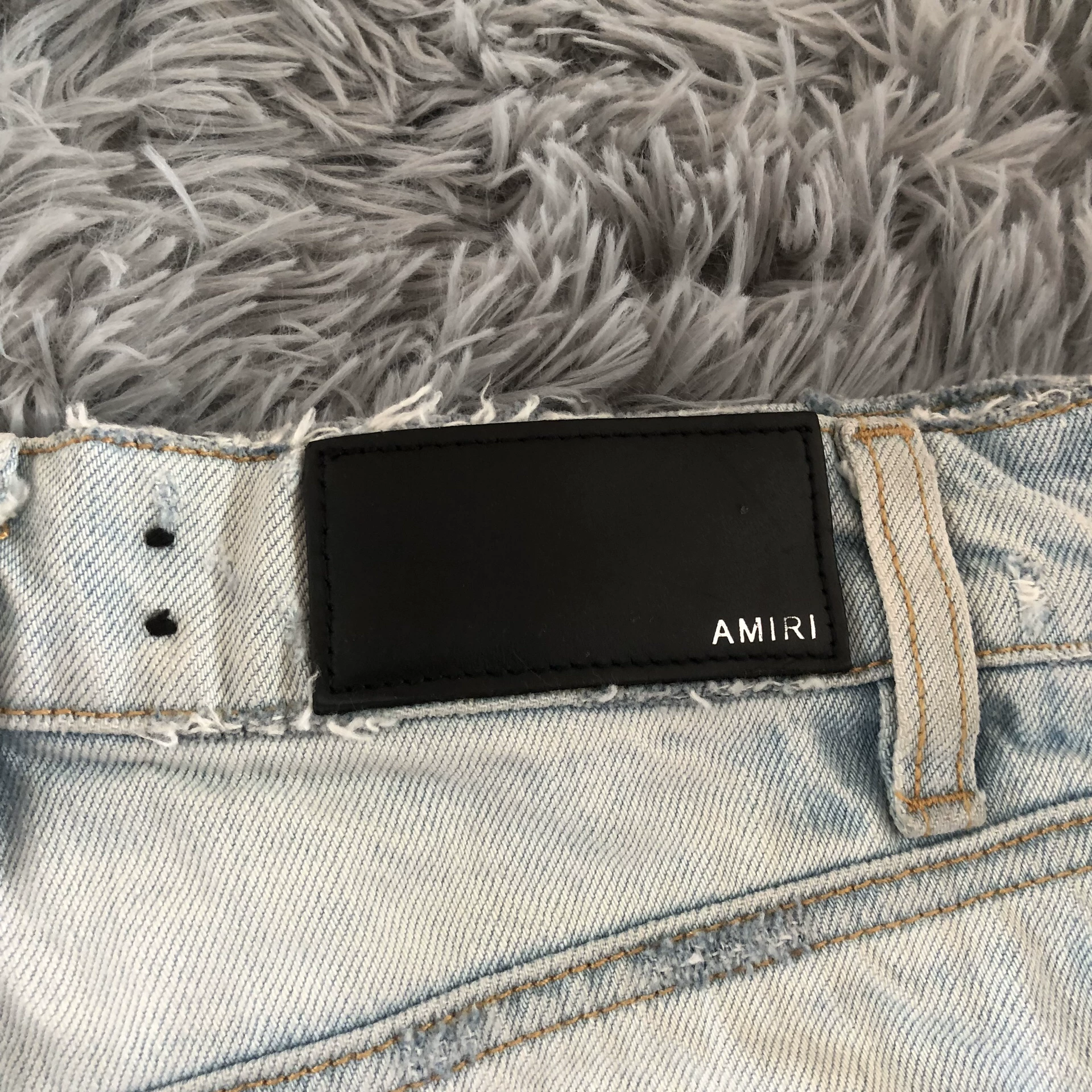 Amiri Light Blue Distressed Denim Skirt — label