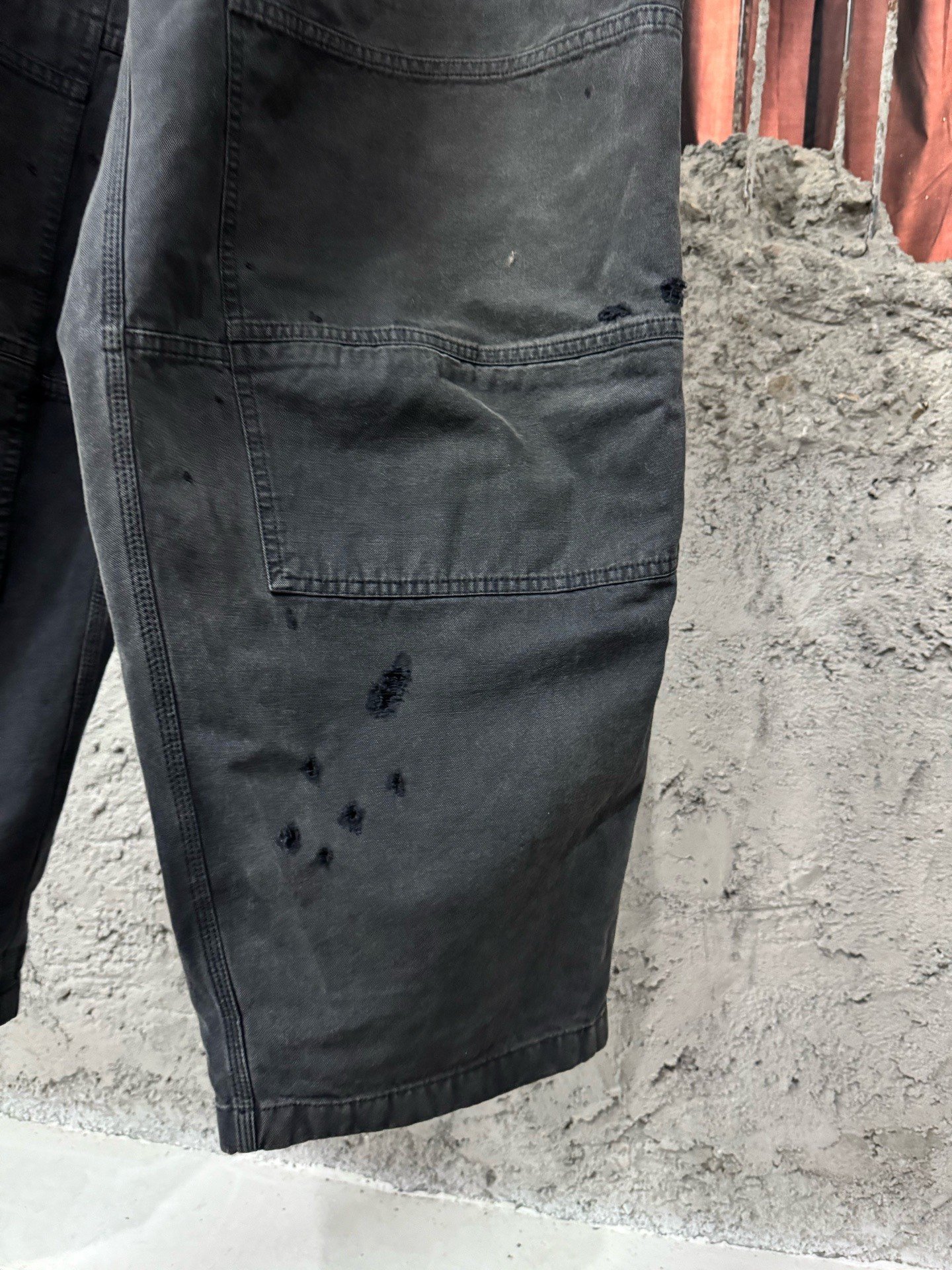 Balenciaga Distressed Destroyed Logger Pants — label