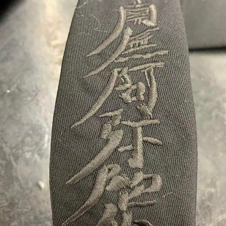 Yohji Yamamoto White Graphic Tie — detail