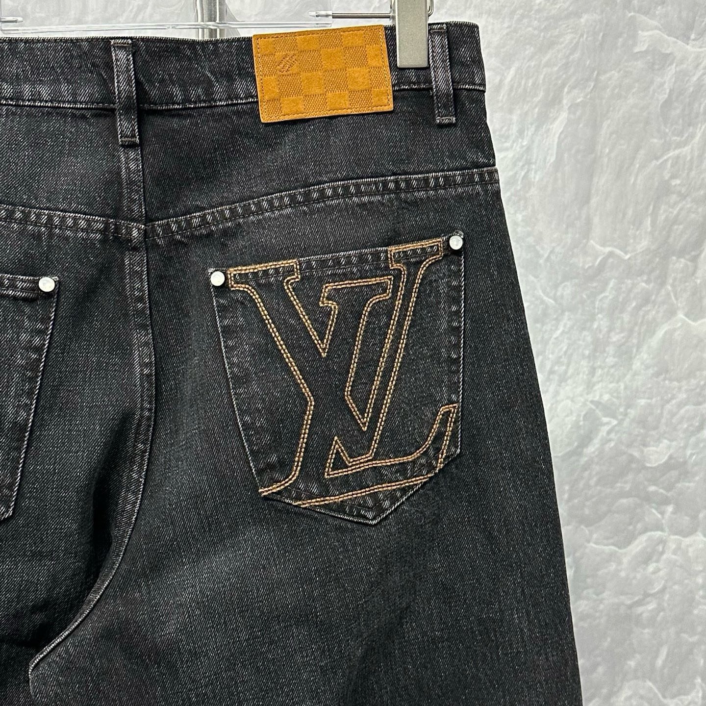 Louis Vuitton SS26 Embroidered Logo Denim Pants — detail