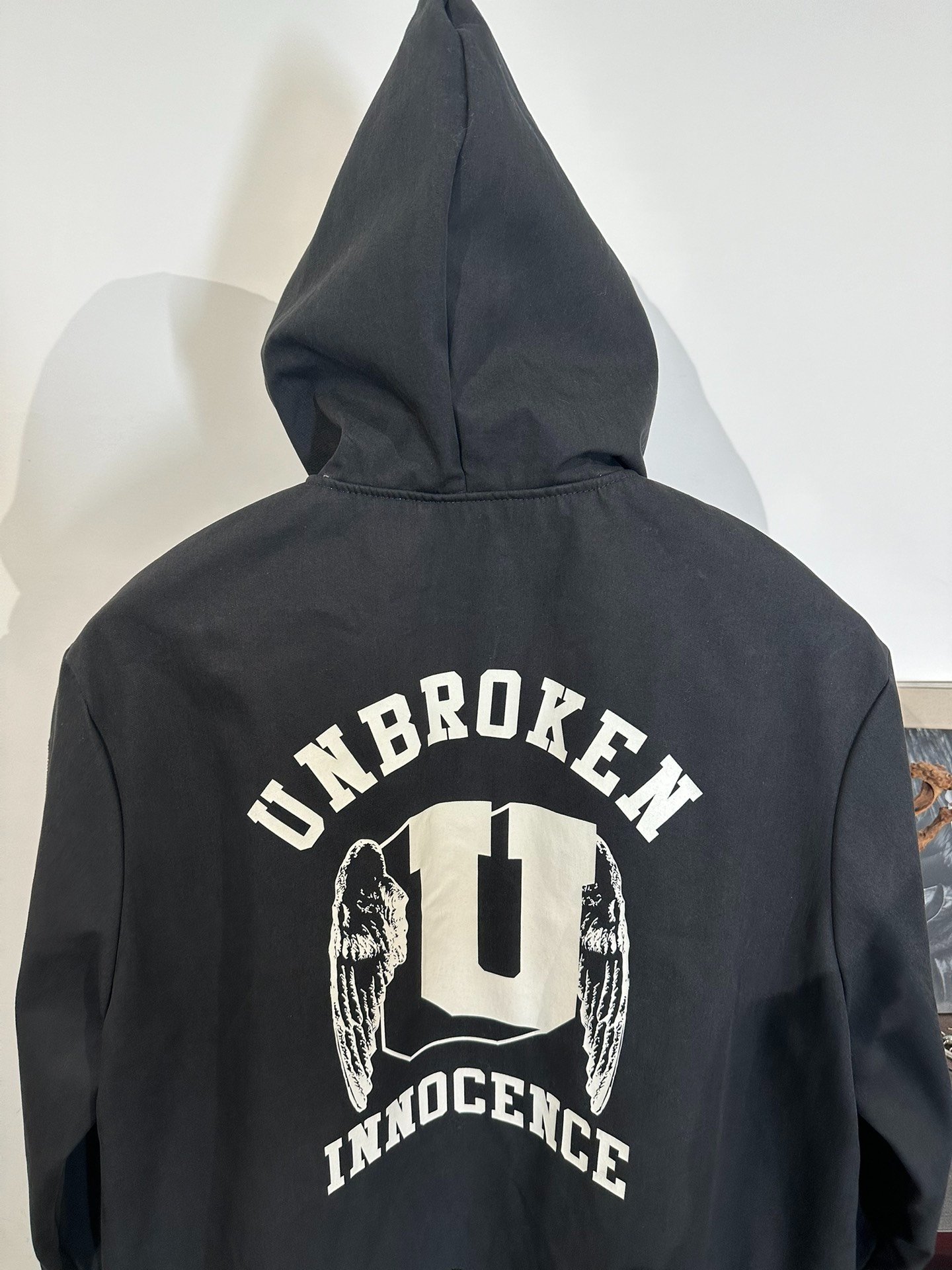 Uniqlo Mid-Length Hooded Patch Jacket — label