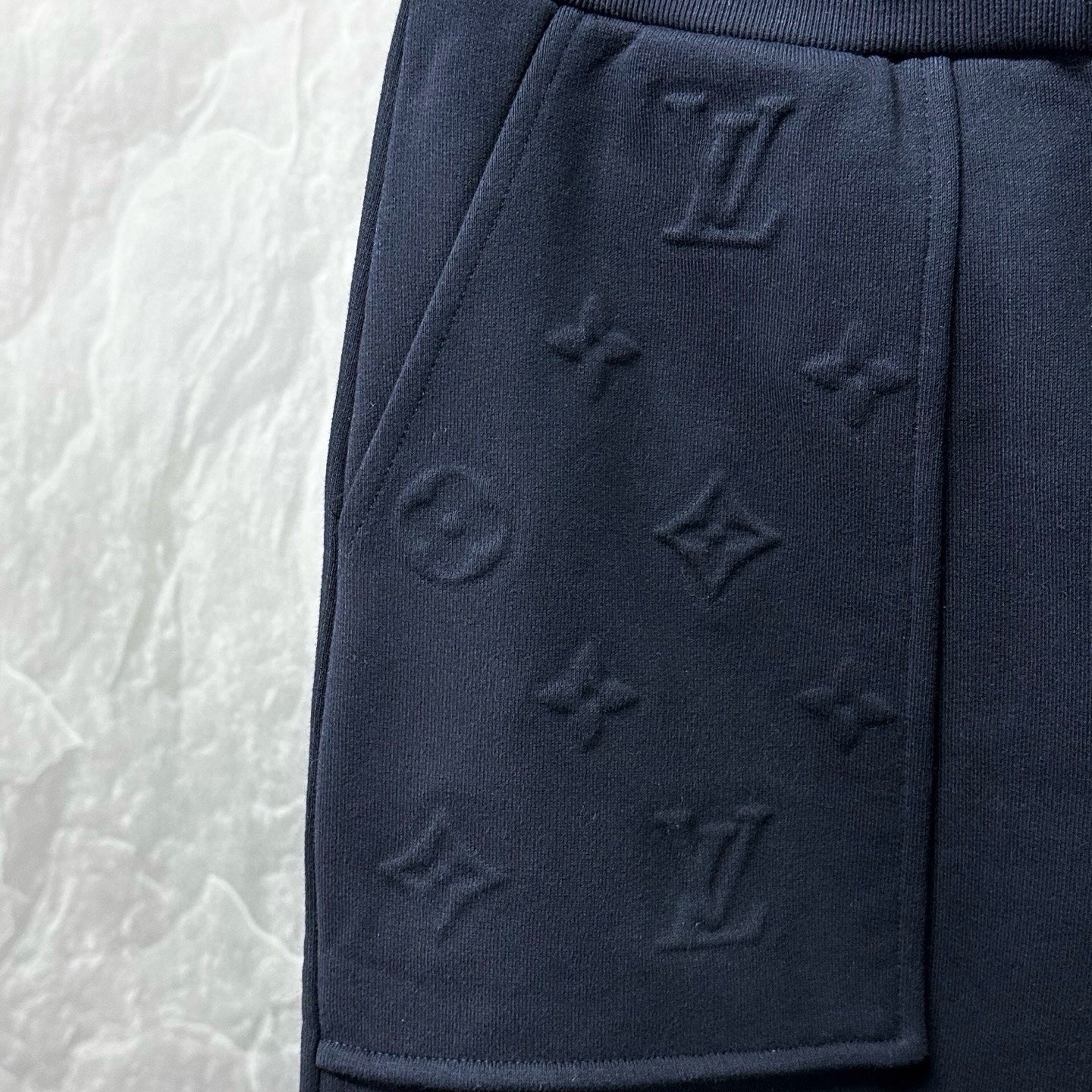 Louis Vuitton SS26 Embossed Drawstring Casual Pants — detail