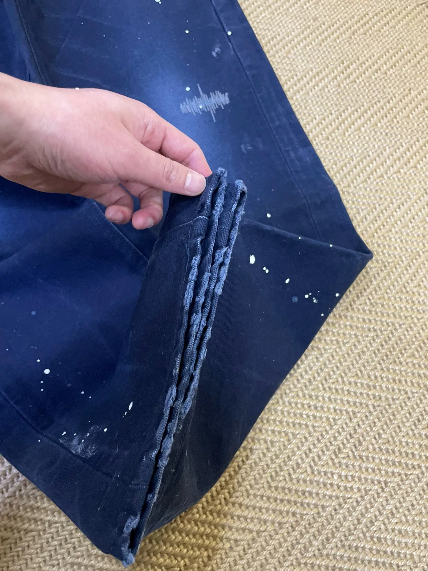 UE x Carhartt Damaged Casual Pants — label