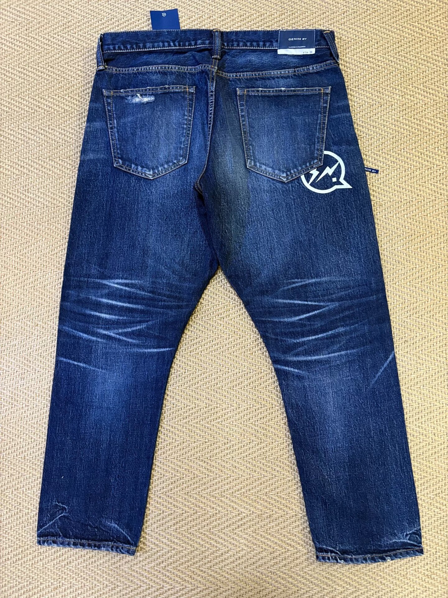 Vanquish & Fragment Washed Distressed Jeans — front